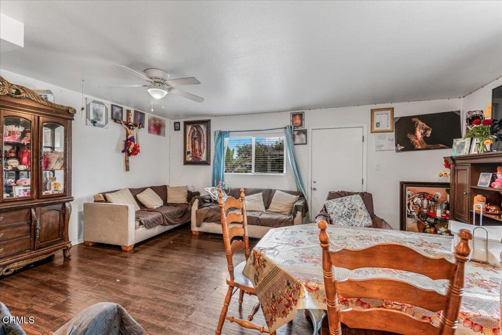 970 Laurel Street West Oxnard, CA 93033 - Photo 9 of 40 a bedroom with furniture and a flat screen tv