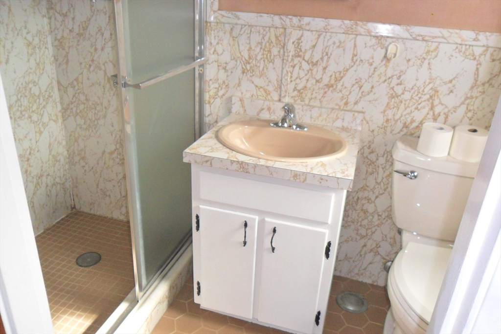 295 A Winter Street Ashland, MA 01721 - Photo 7 of 20 a bathroom with a sink and a mirror