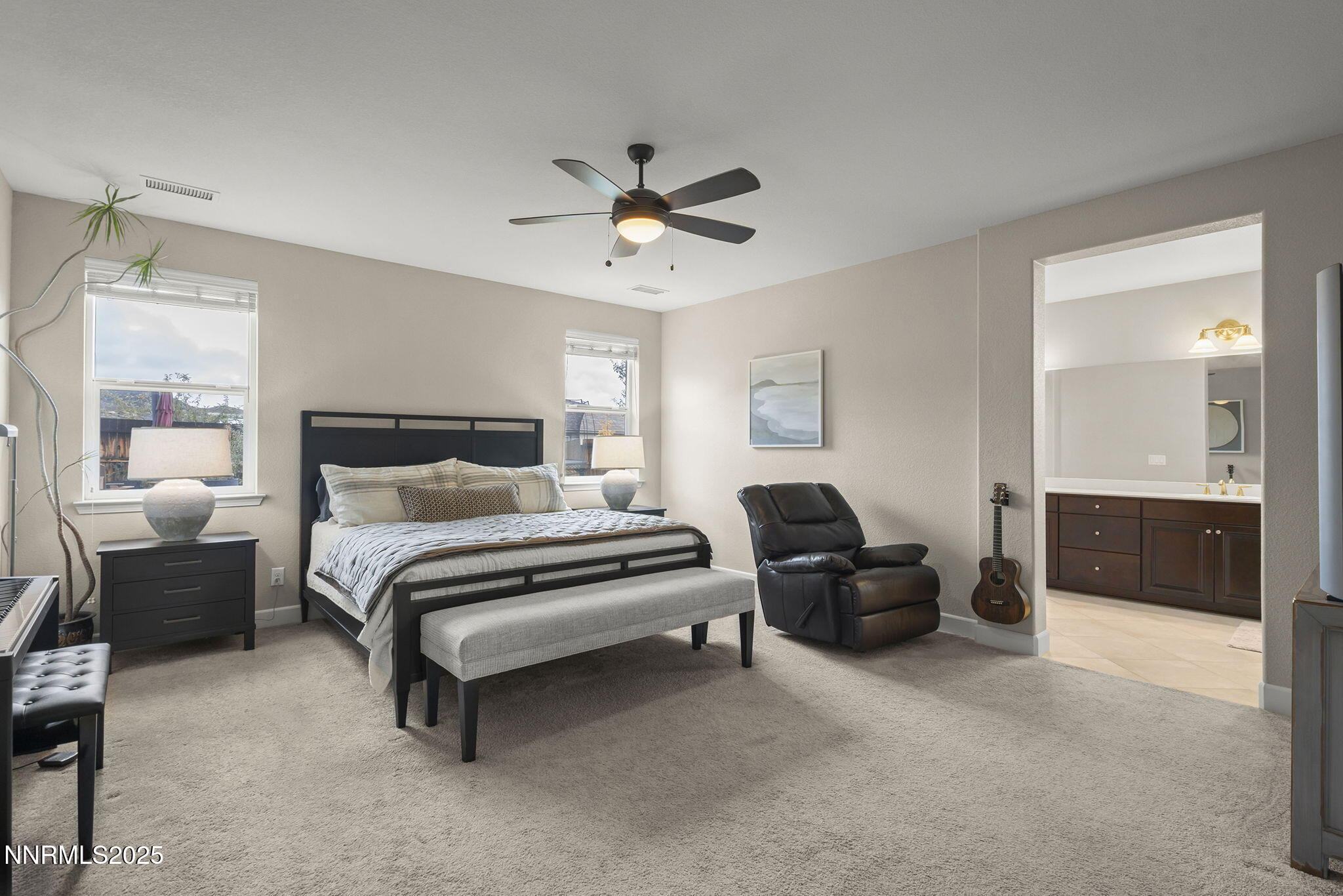 2835 Tobiano Drive Reno, NV 89521 - Photo 18 of 33 a bedroom with a bed and furniture