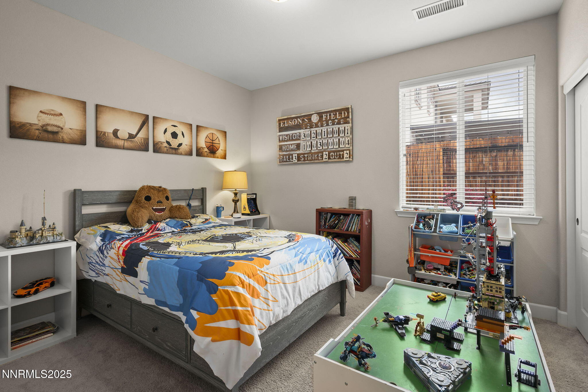 2835 Tobiano Drive Reno, NV 89521 - Photo 24 of 33 a bed room with a bed and a window