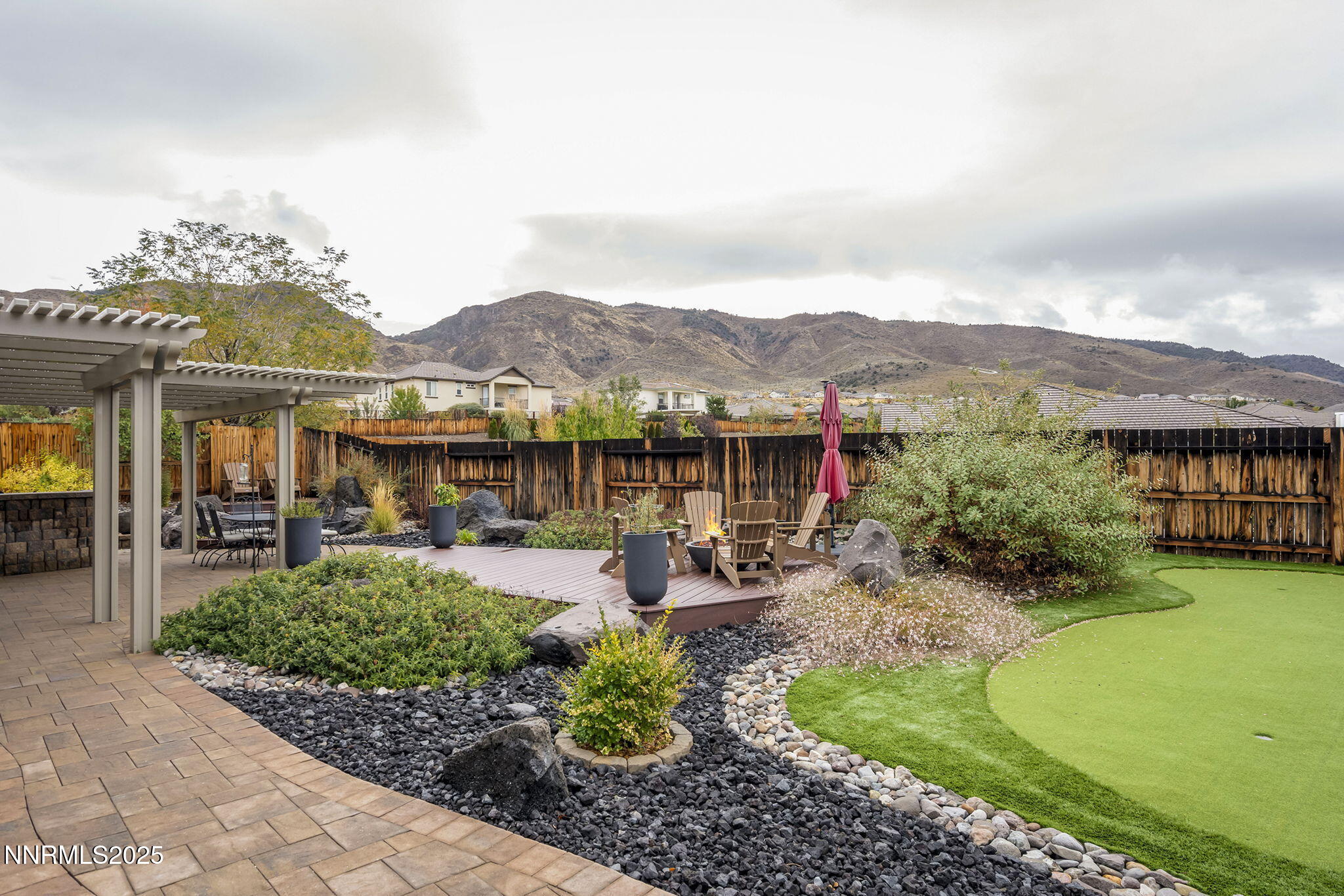 2835 Tobiano Drive Reno, NV 89521 - Photo 33 of 33 a view of a patio with chair and tables