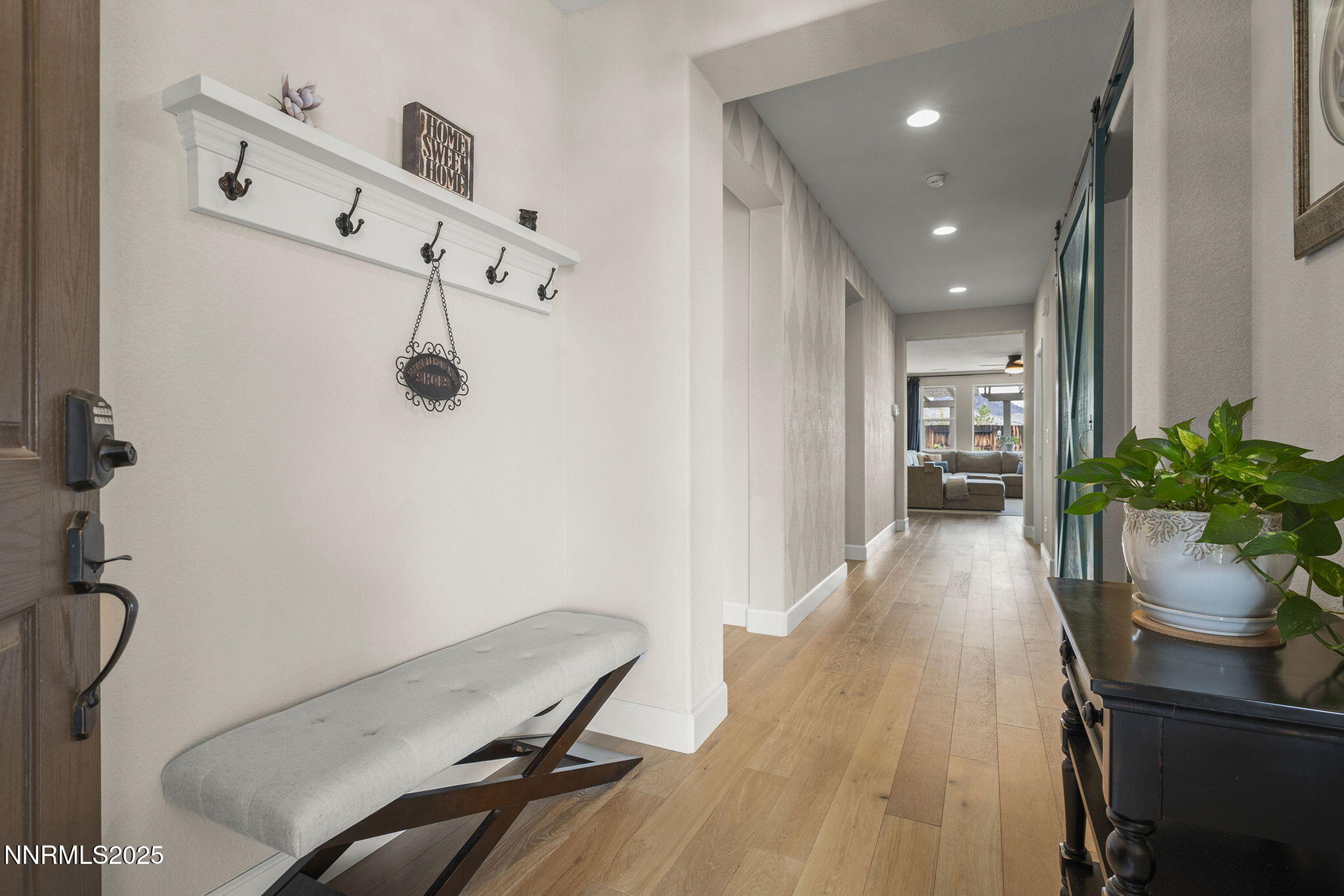 2835 Tobiano Drive Reno, NV 89521 - Photo 4 of 33 a view of a hallway with seating area