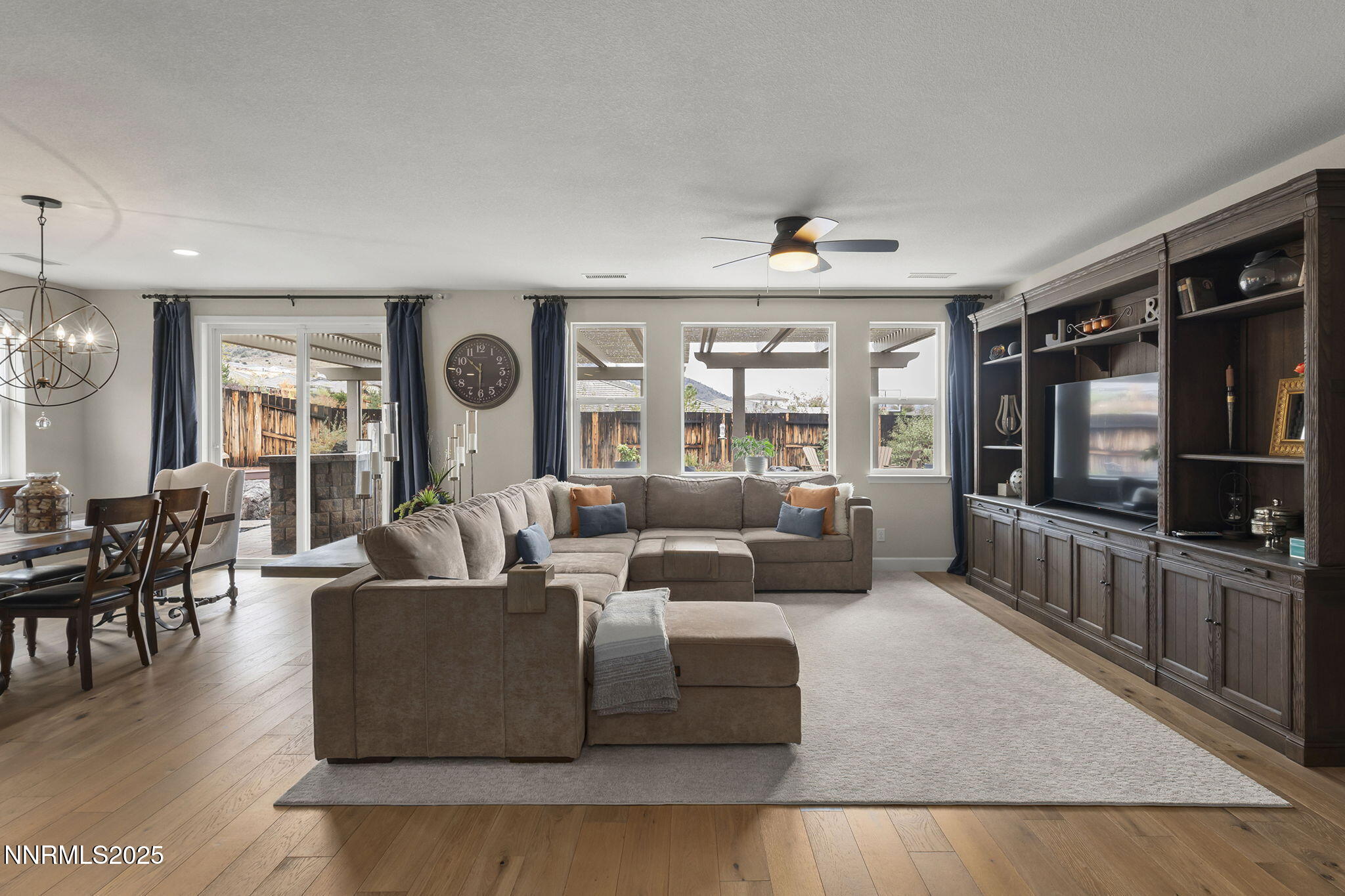 2835 Tobiano Drive Reno, NV 89521 - Photo 5 of 33 a living room with furniture and a flat screen tv
