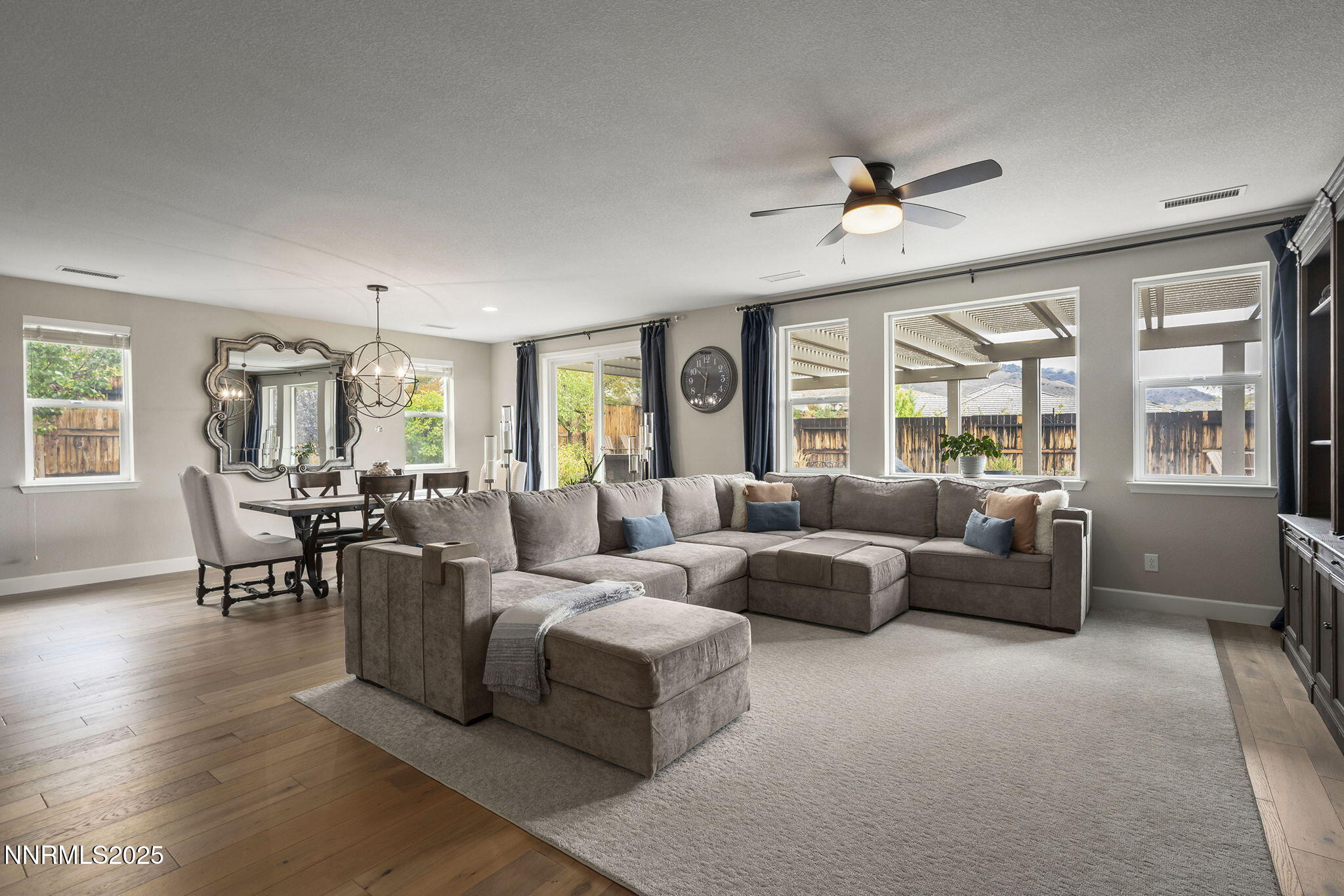 2835 Tobiano Drive Reno, NV 89521 - Photo 6 of 33 a living room with furniture and a large window
