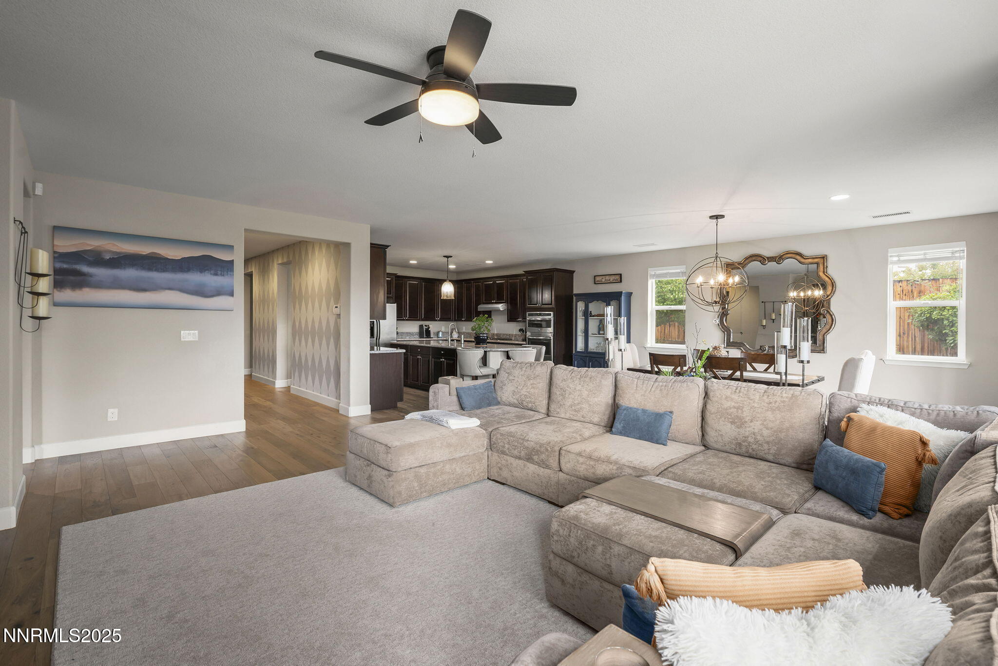 2835 Tobiano Drive Reno, NV 89521 - Photo 7 of 33 a living room with furniture and a view of kitchen