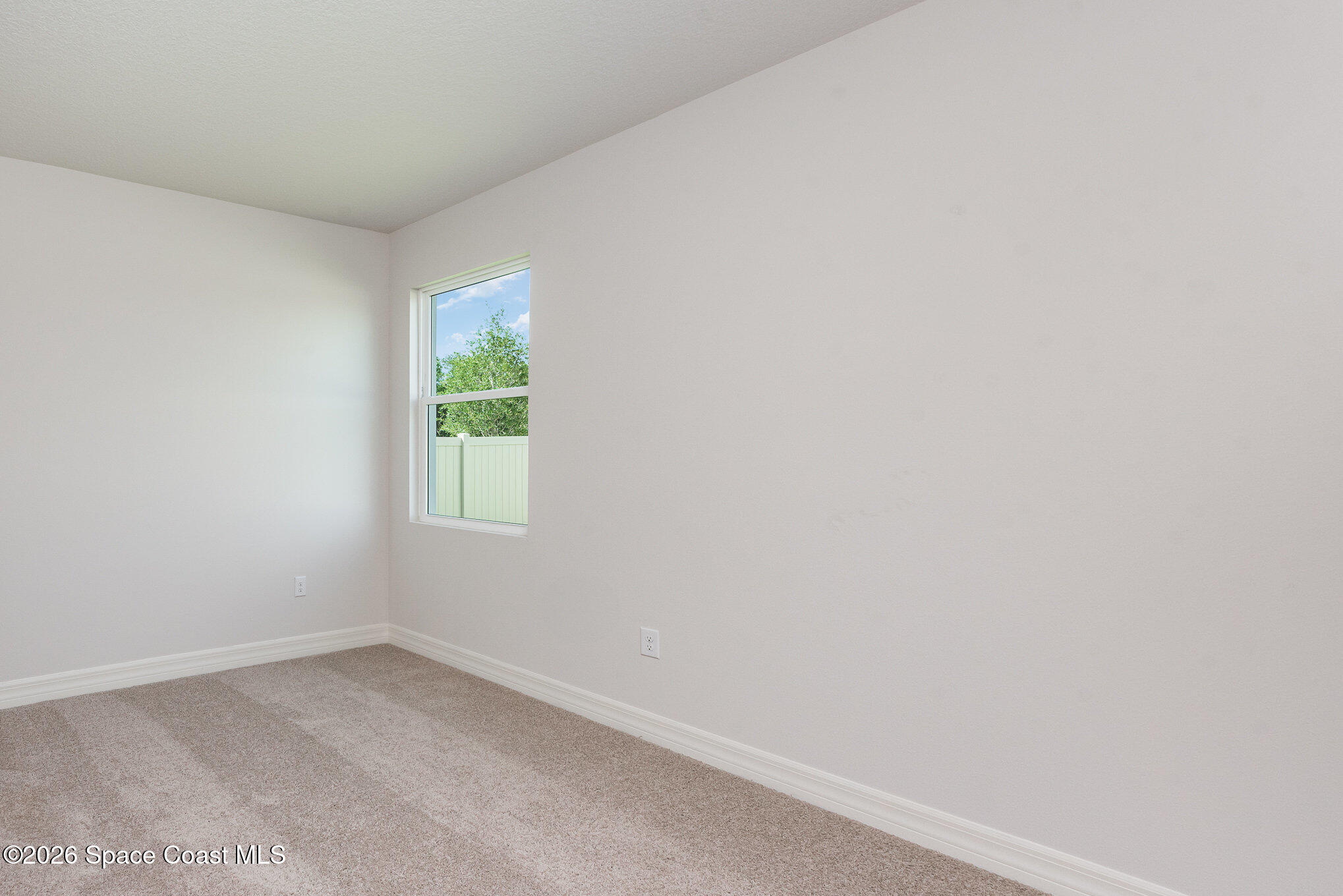 150 First Light Circle Cocoa, FL 32922 - Photo 13 of 28 an empty room with a window