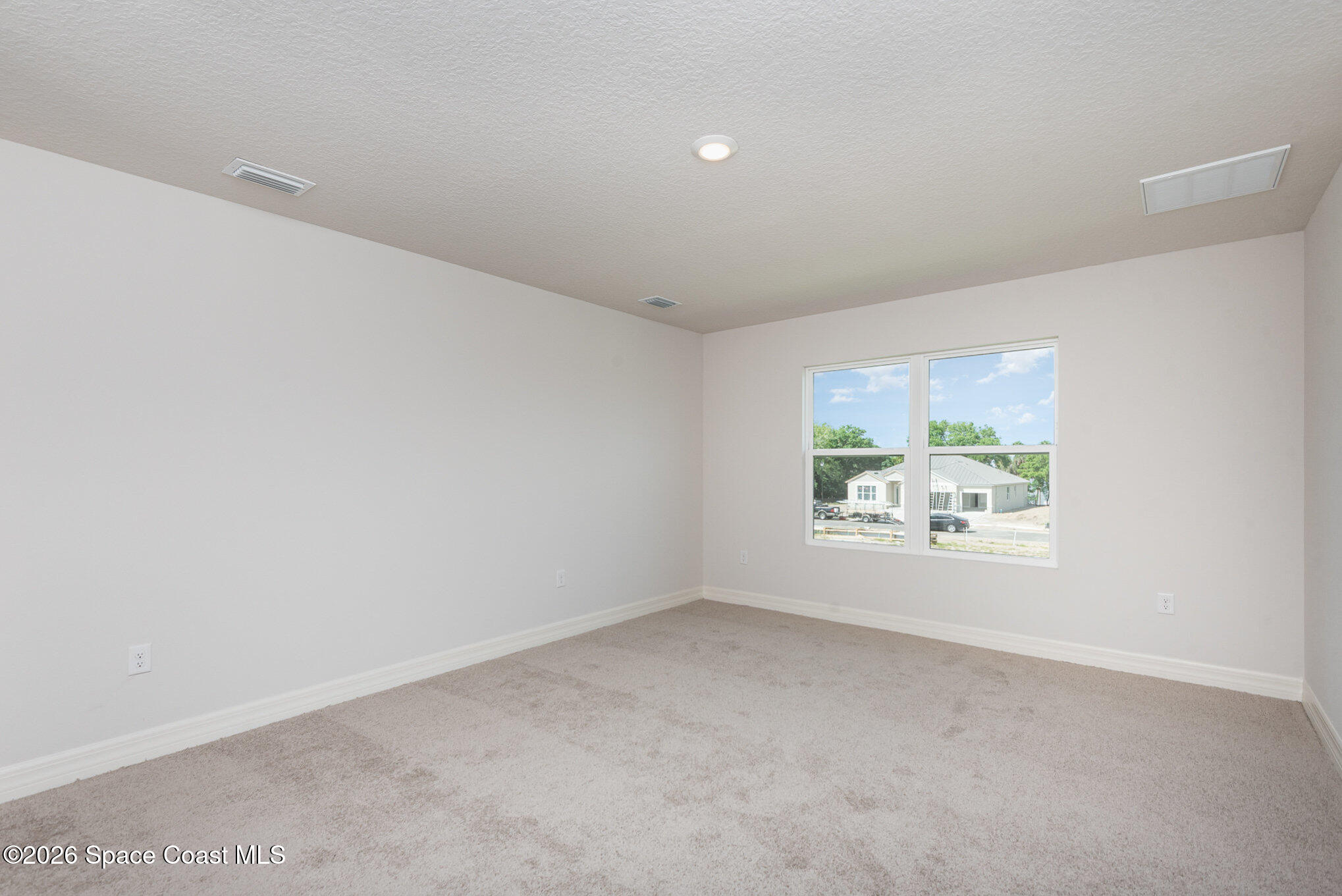 150 First Light Circle Cocoa, FL 32922 - Photo 18 of 28 an empty room with windows