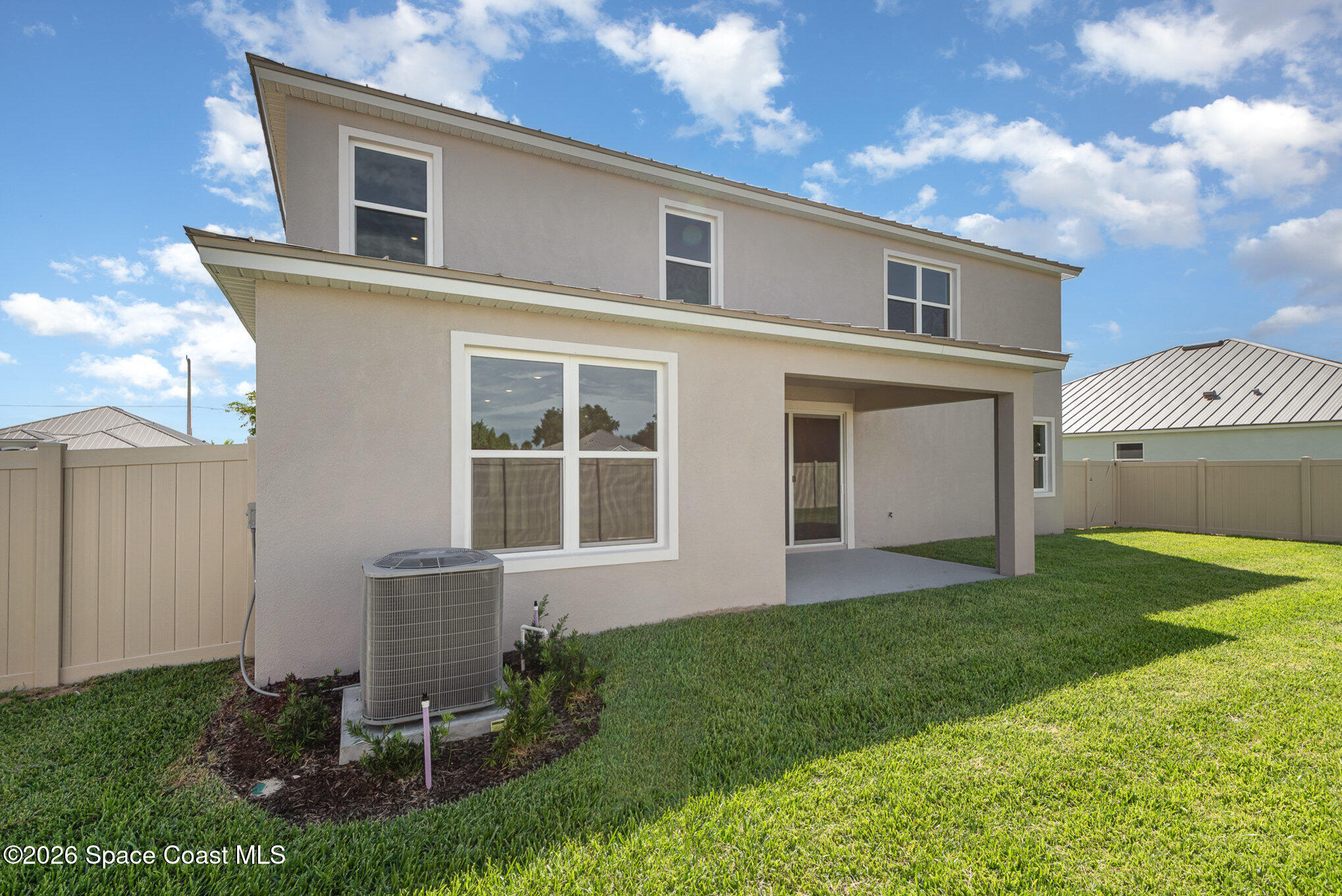 150 First Light Circle Cocoa, FL 32922 - Photo 27 of 28 a house view with a garden space