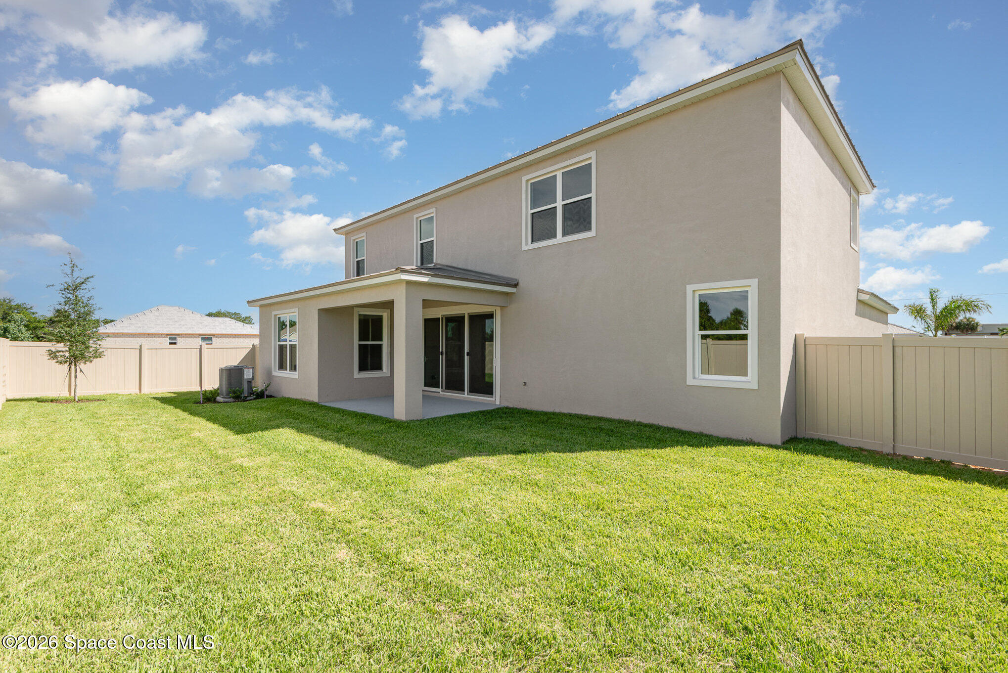 150 First Light Circle Cocoa, FL 32922 - Photo 28 of 28 a view of a house with a yard and garage