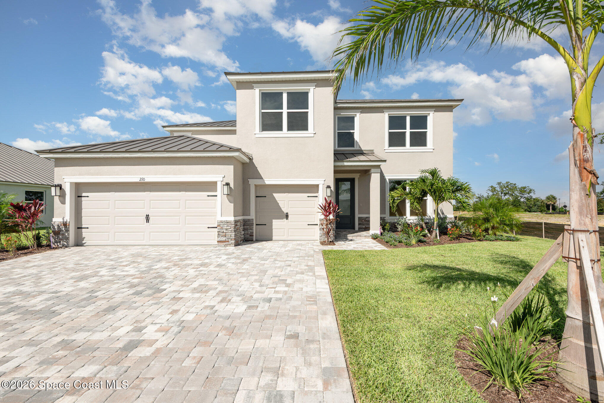 150 First Light Circle Cocoa, FL 32922 - Photo 3 of 28 a view of a house with backyard and a tree