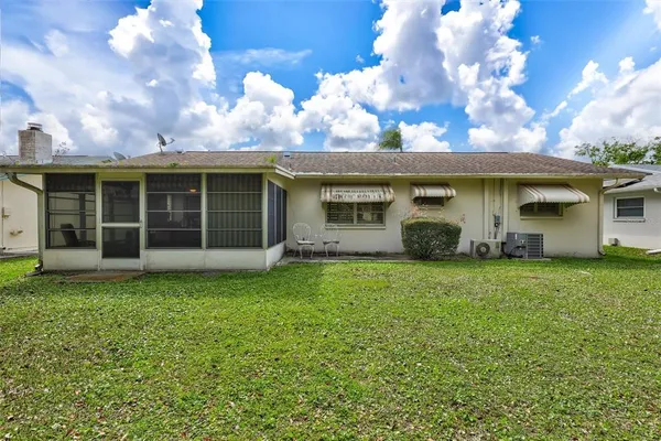 a view of a garden with a tree