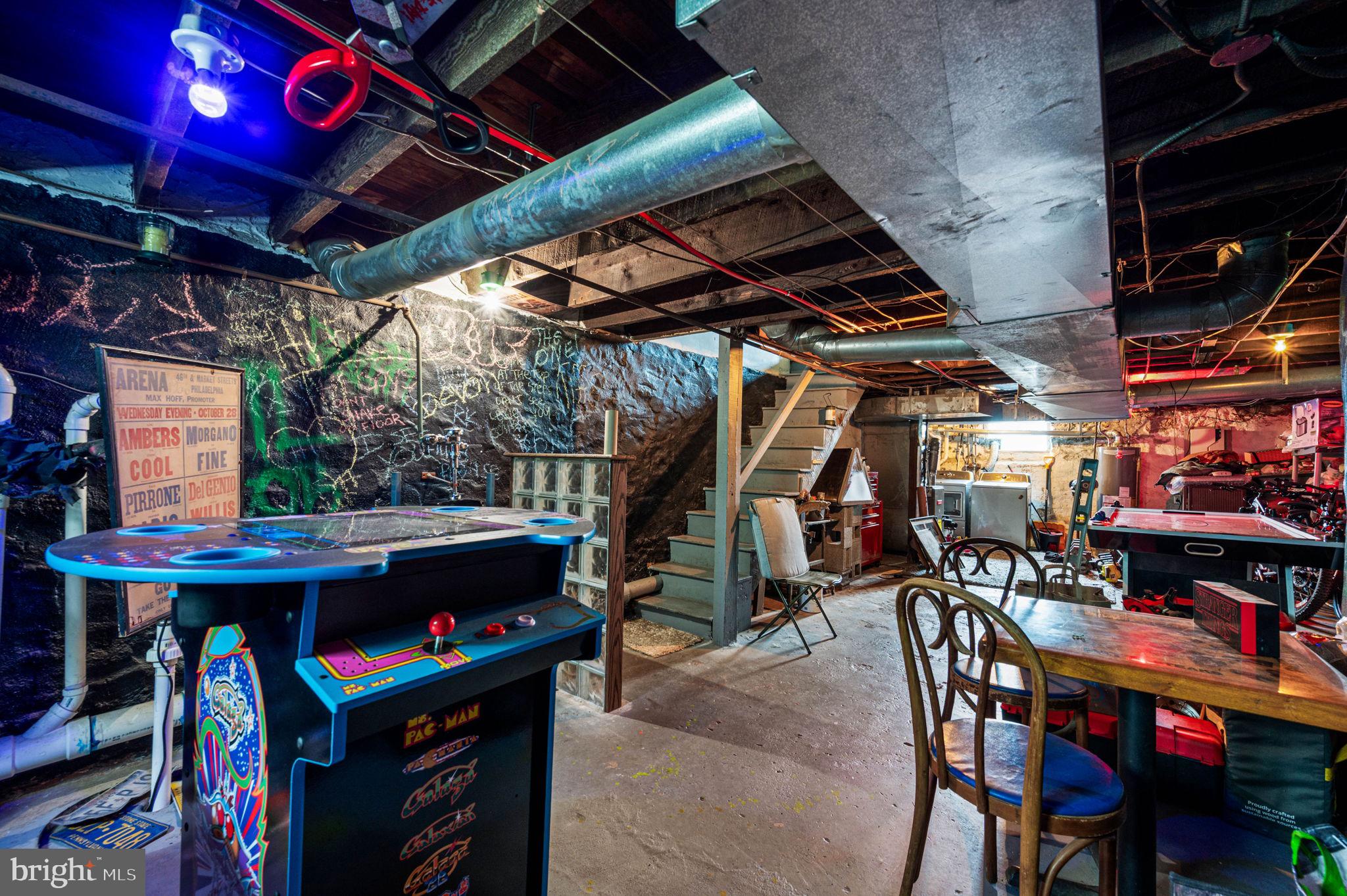 3 Township Line Road Elkins Park, PA 19027 - Photo 32 of 40 Vibrant basement with retro arcade flair.