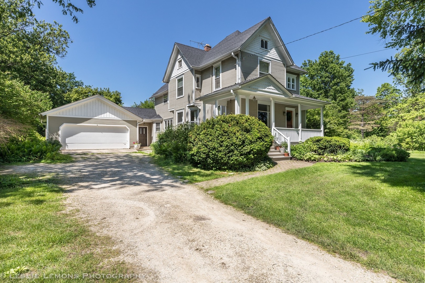32-w028 Army Trail Road Wayne, IL 60184 - Photo 2 of 39 a front view of a house with garden