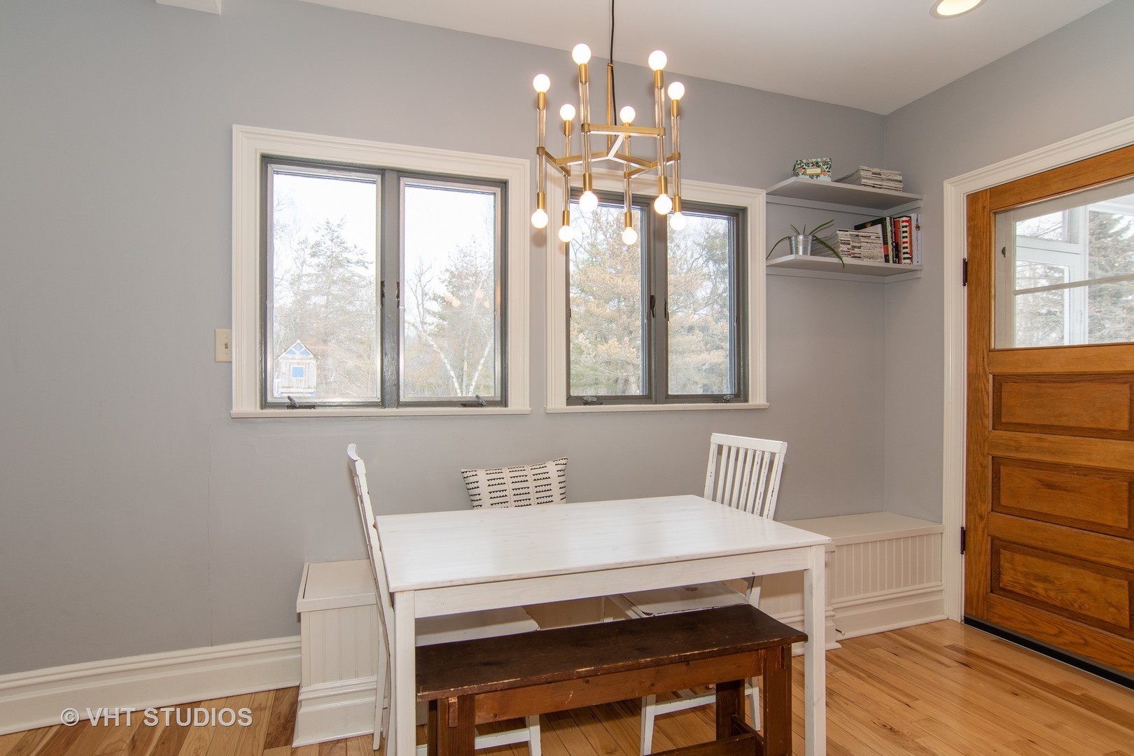 32-w028 Army Trail Road Wayne, IL 60184 - Photo 12 of 39 a view of a dining room with furniture window and wooden floor