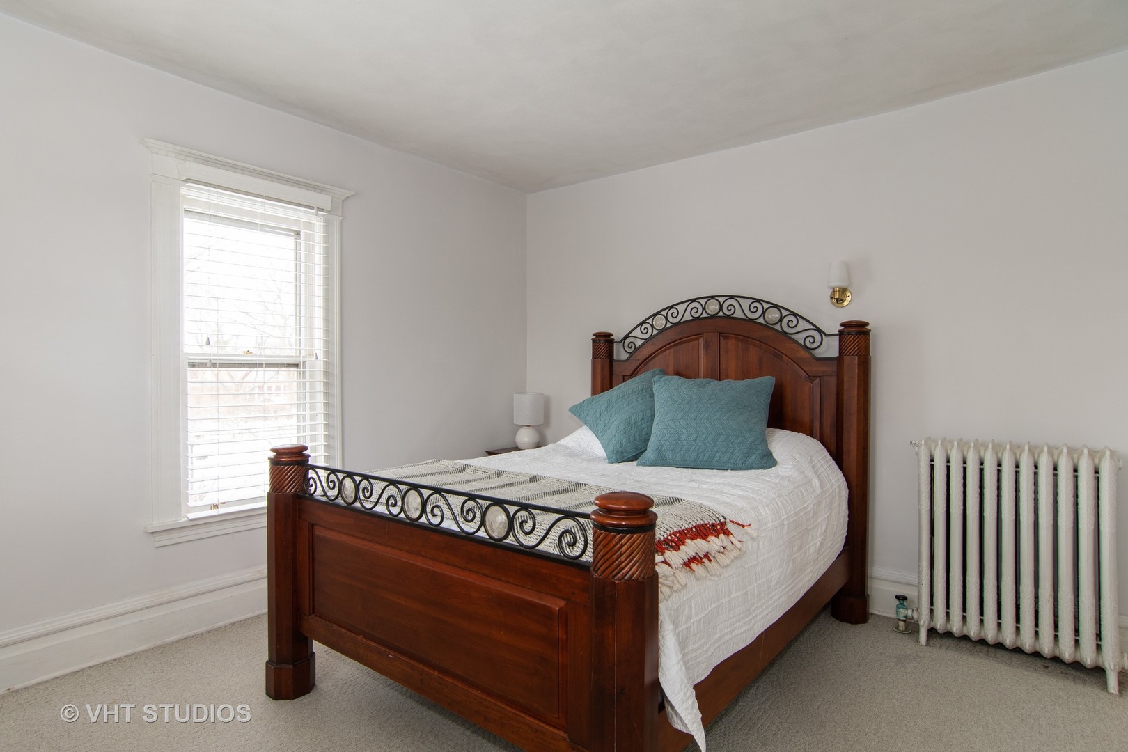 32-w028 Army Trail Road Wayne, IL 60184 - Photo 22 of 39 a bedroom with a bed and window