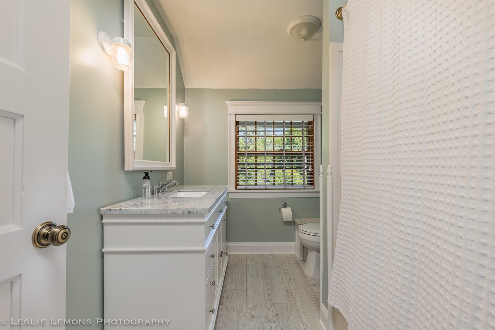 32-w028 Army Trail Road Wayne, IL 60184 - Photo 23 of 39 a bathroom with a sink toilet and shower