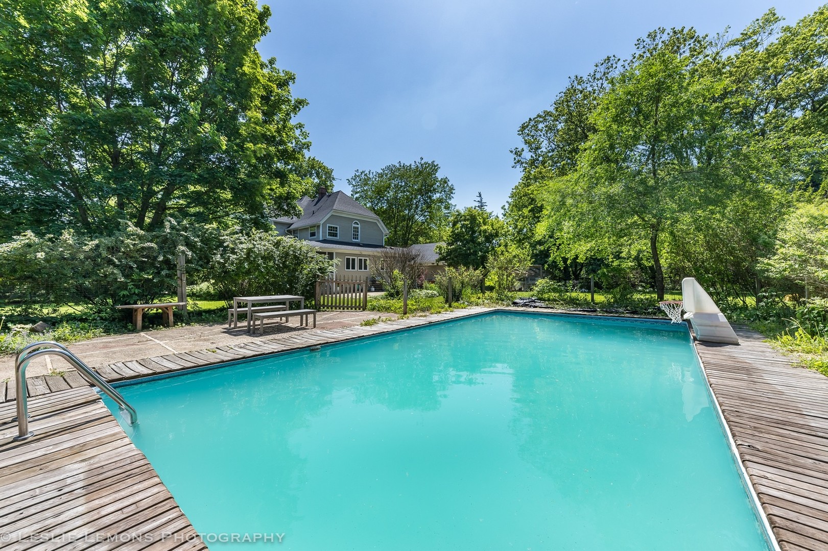 32-w028 Army Trail Road Wayne, IL 60184 - Photo 32 of 39 a view of a swimming pool with a patio