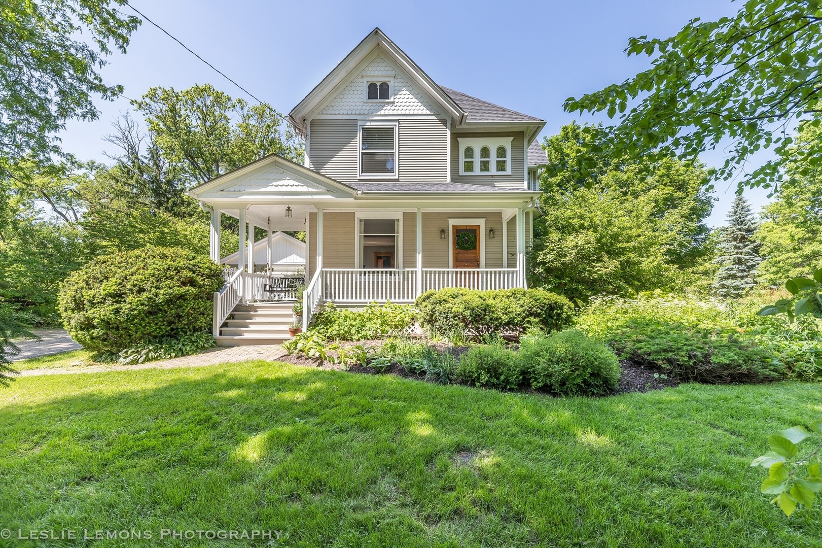 32-w028 Army Trail Road Wayne, IL 60184 - Photo 33 of 39 a front view of a house with a yard