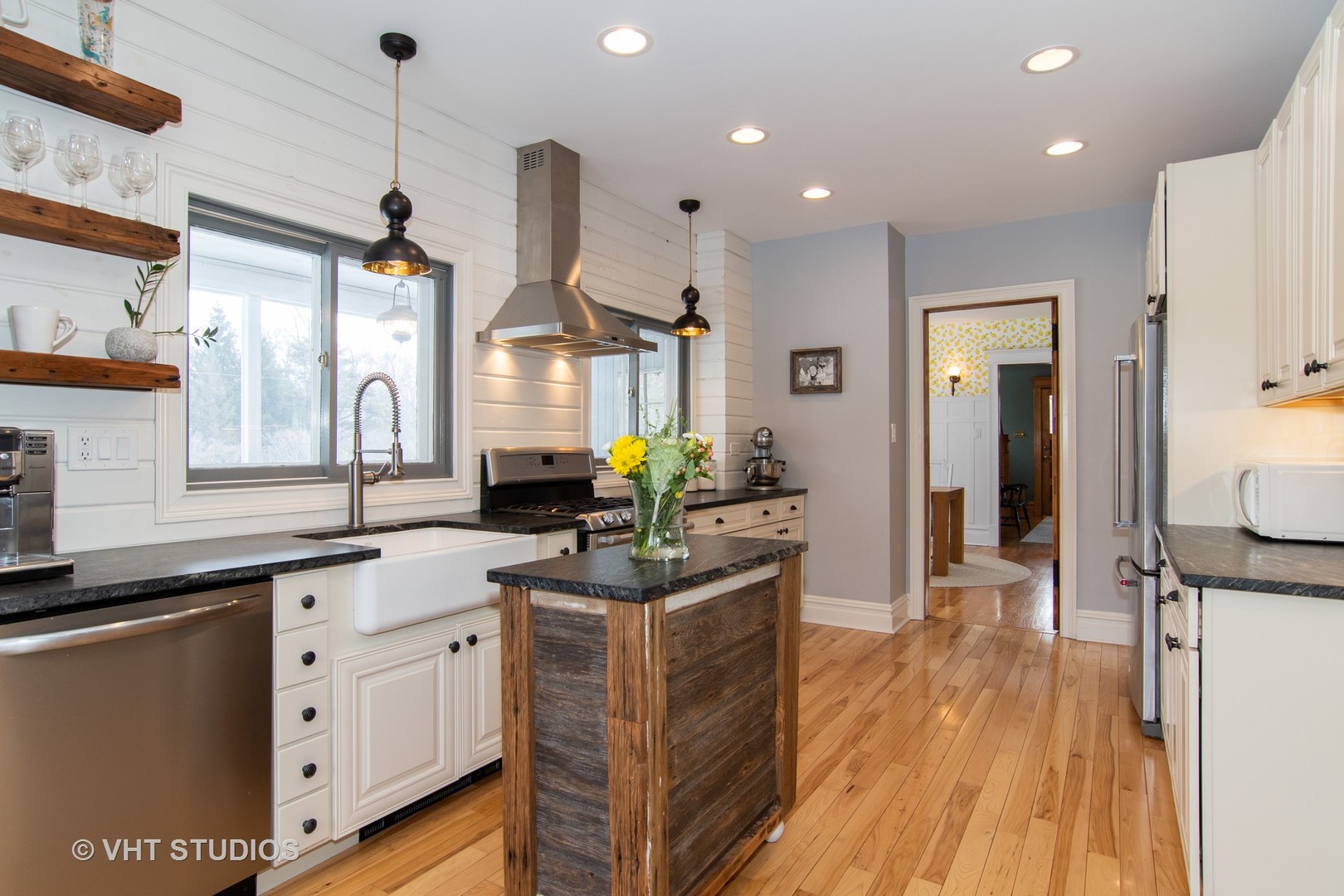 32-w028 Army Trail Road Wayne, IL 60184 - Photo 8 of 39 a kitchen with a sink appliances and wooden floor