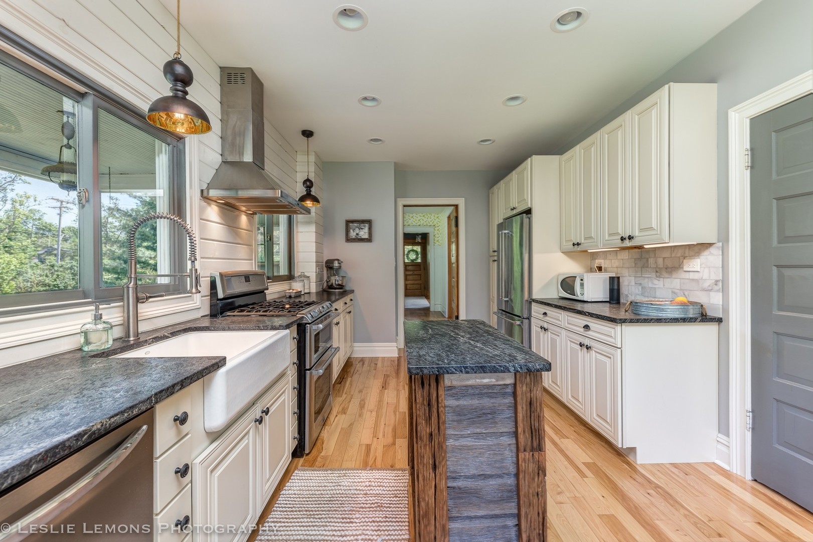 32-w028 Army Trail Road Wayne, IL 60184 - Photo 9 of 39 a kitchen with granite countertop counter space a sink appliances and cabinets