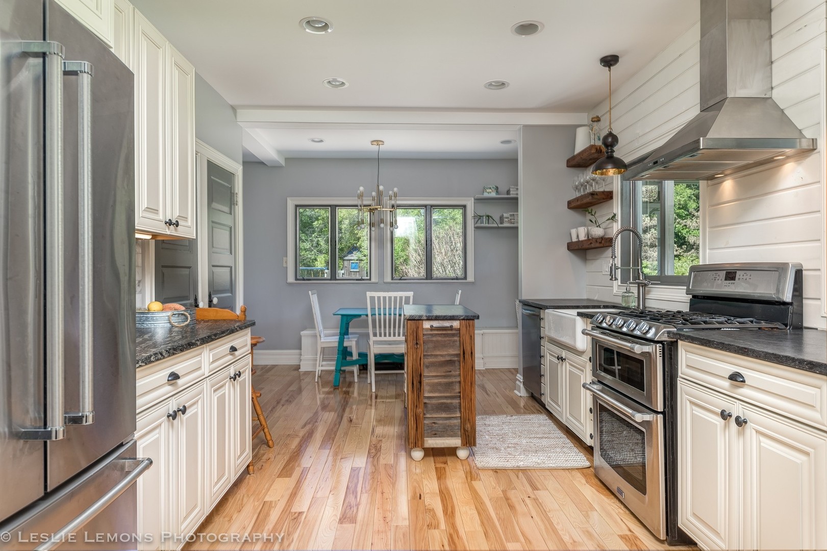 32-w028 Army Trail Road Wayne, IL 60184 - Photo 10 of 39 a kitchen with granite countertop a stove oven and sink