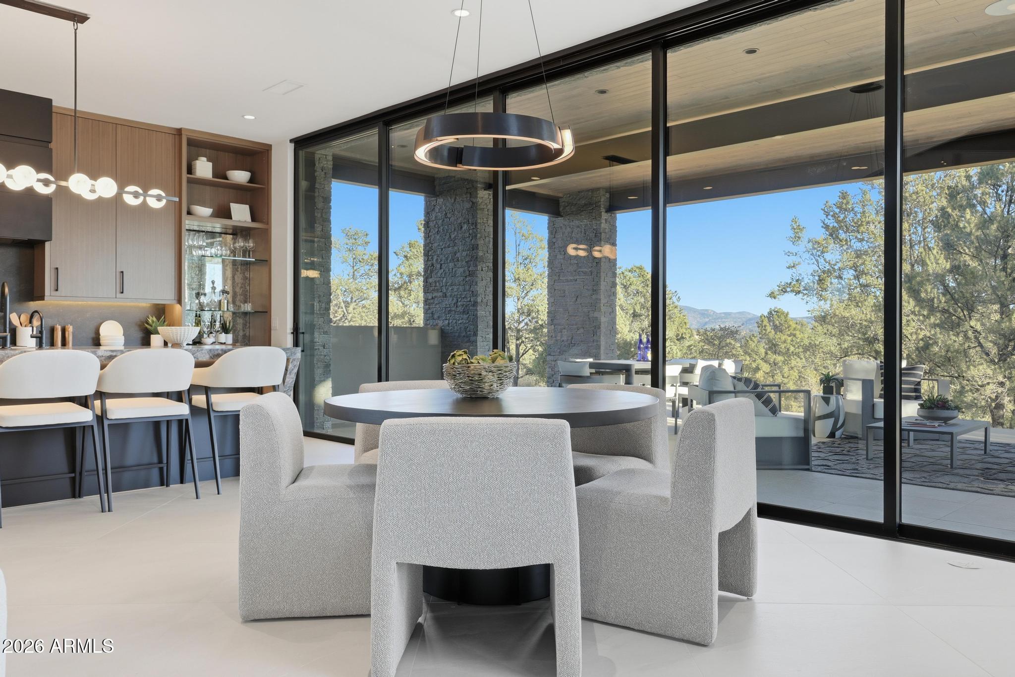 108 South Rim Club Drive Payson, AZ 85541 - Photo 13 of 56 a view of a dining room with furniture window and outside view