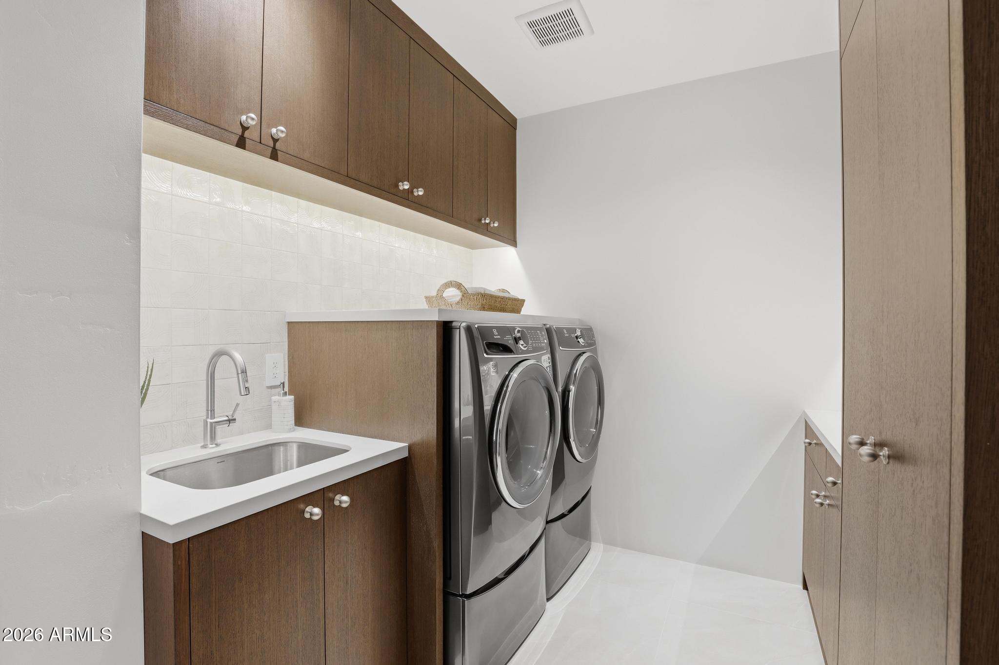 108 South Rim Club Drive Payson, AZ 85541 - Photo 21 of 56 a utility room with dryer and washer