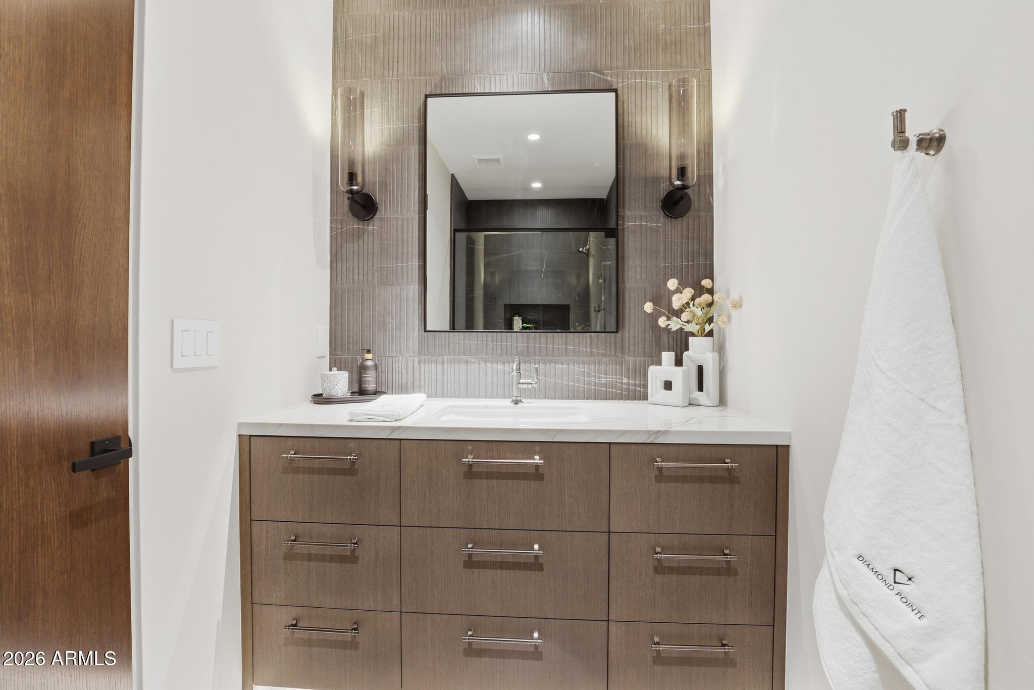 108 South Rim Club Drive Payson, AZ 85541 - Photo 24 of 56 a bathroom with a sink and a mirror