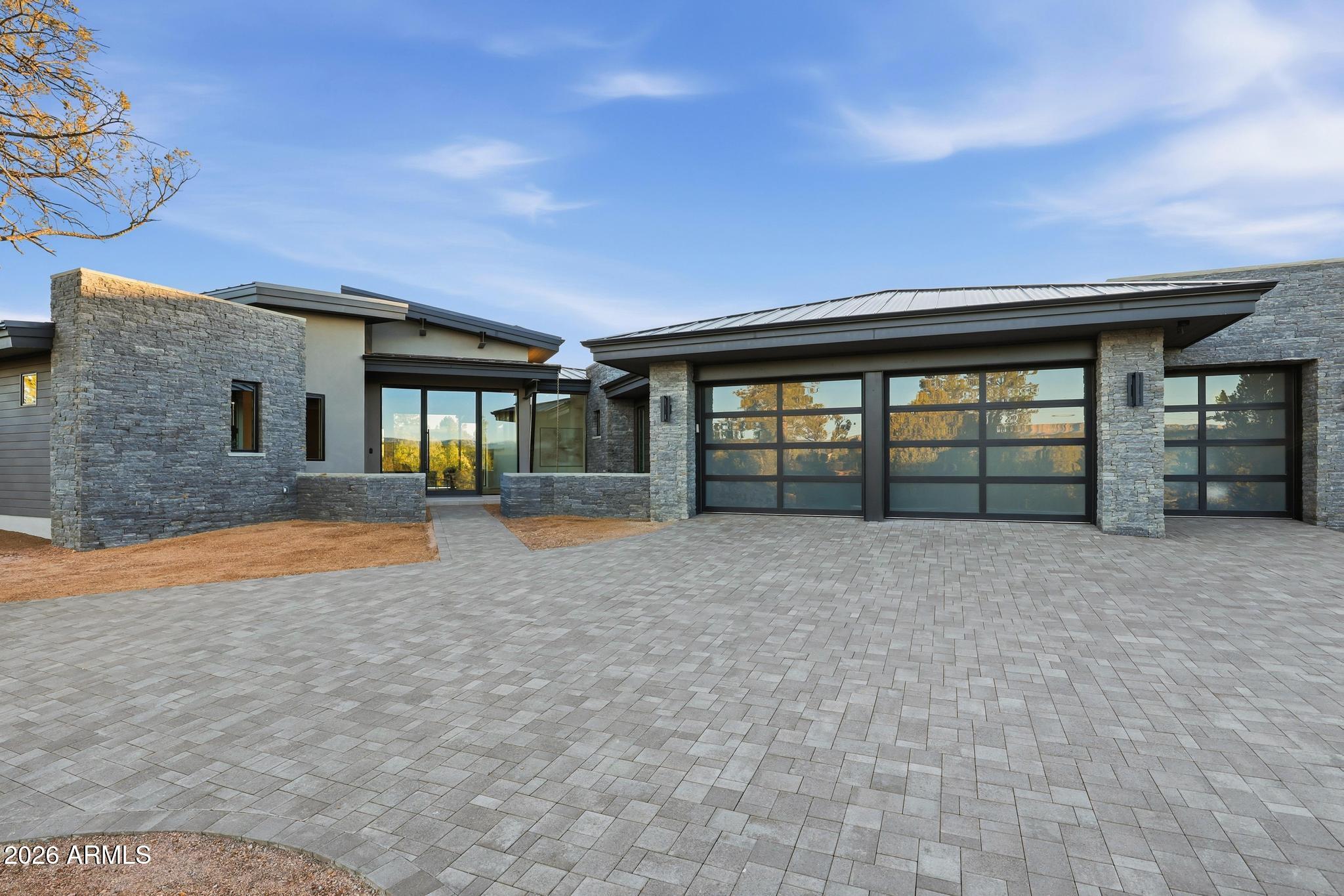 108 South Rim Club Drive Payson, AZ 85541 - Photo 47 of 56 a view of a house with a backyard and a large tree