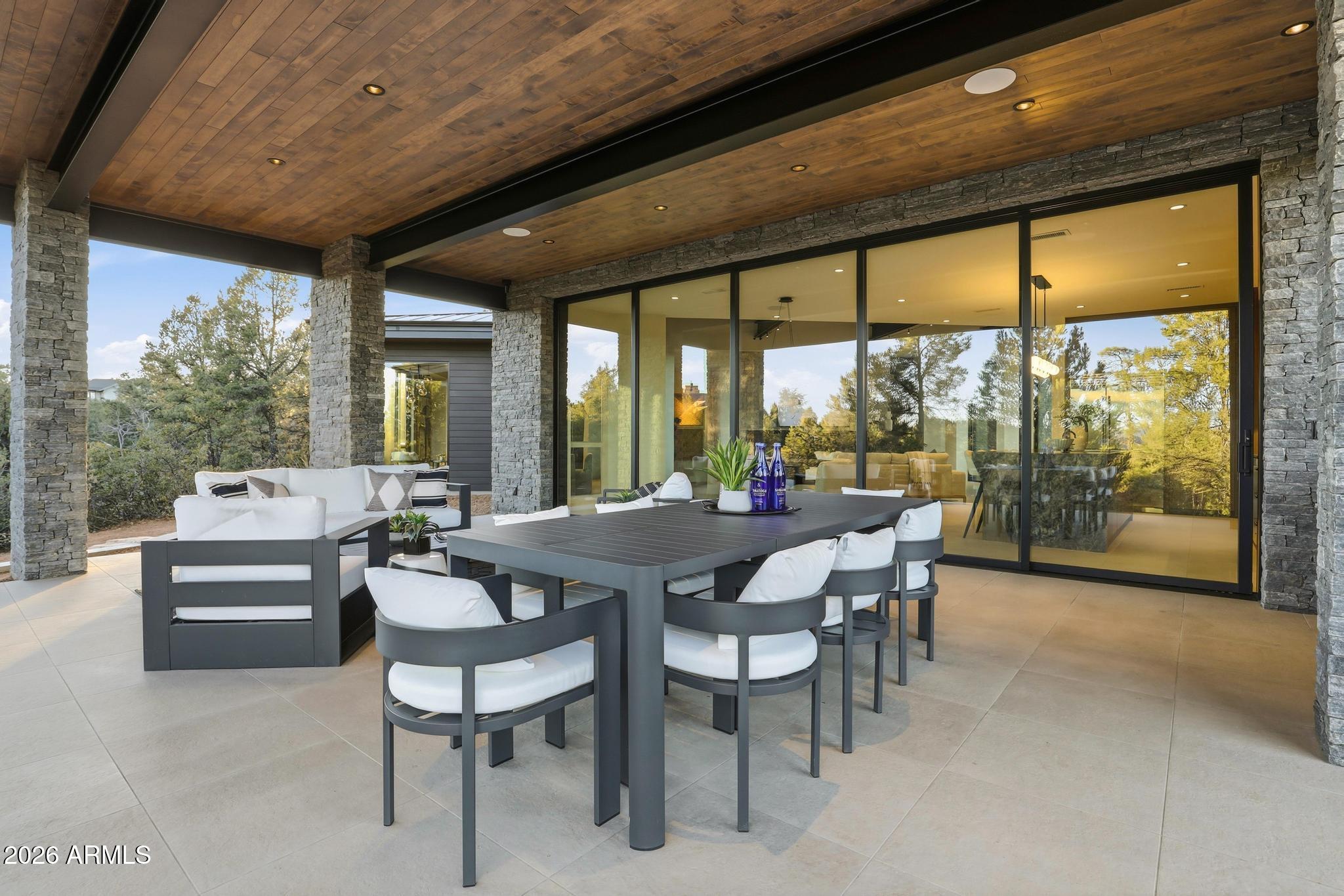 108 South Rim Club Drive Payson, AZ 85541 - Photo 49 of 56 a dining room with furniture and a floor to ceiling window