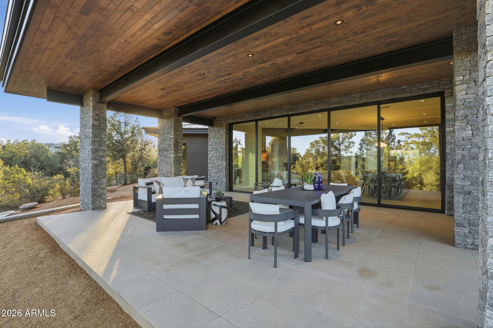108 South Rim Club Drive Payson, AZ 85541 - Photo 54 of 56 a dining room with furniture and a garden