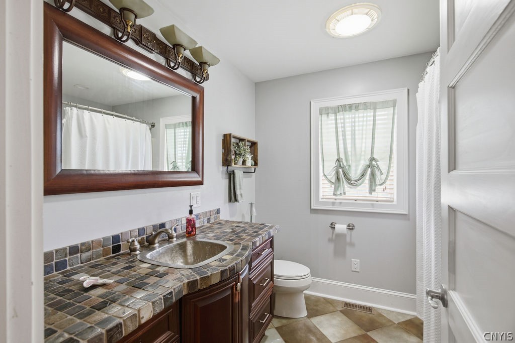 321 West Lake Road Oswego, NY 13126 - Photo 32 of 49 Primary full bath with gorgeous counter tops