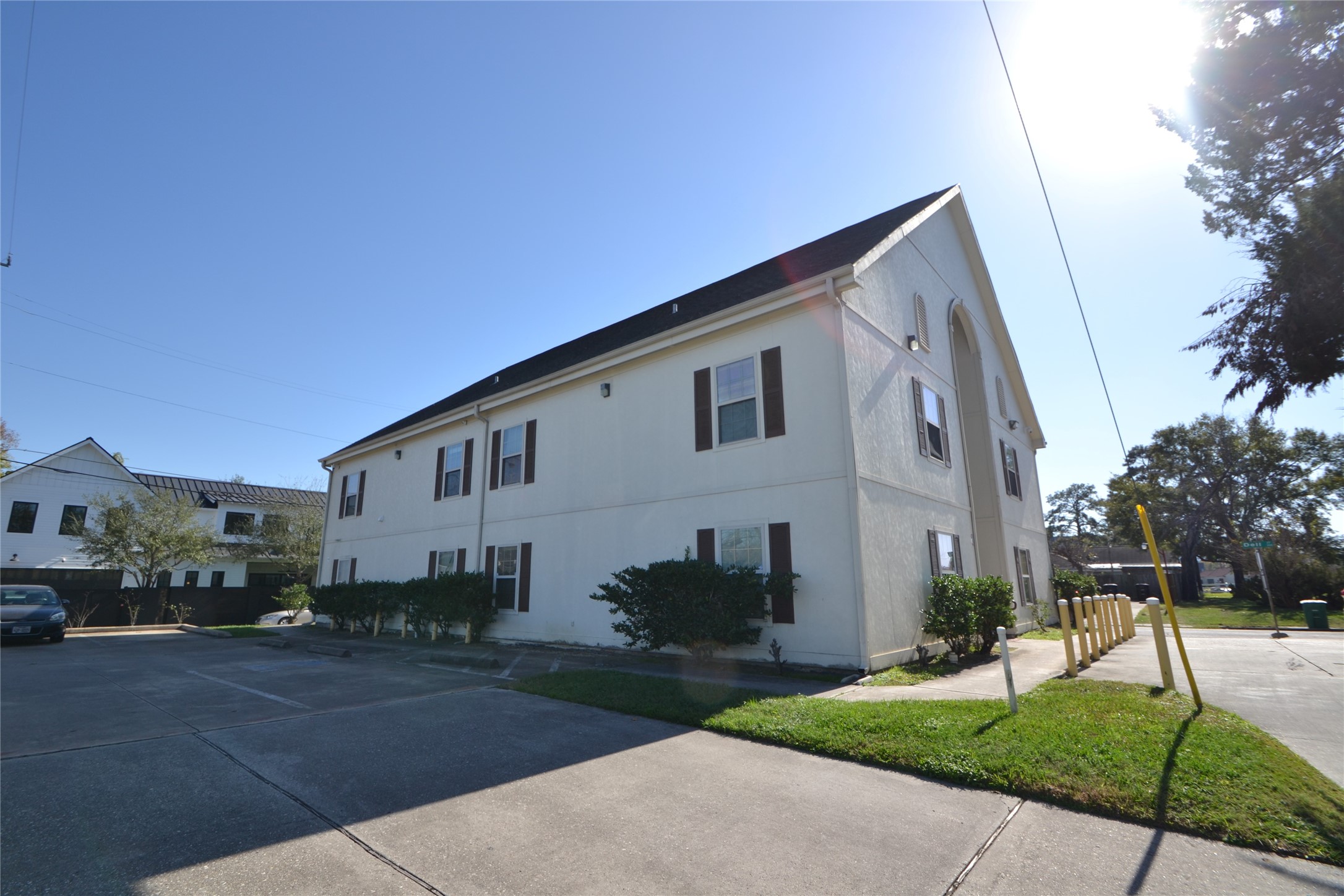 304 Dell Court, Unit 7 Houston, TX 77009 - Photo 11 of 36 a front view of a house with a yard