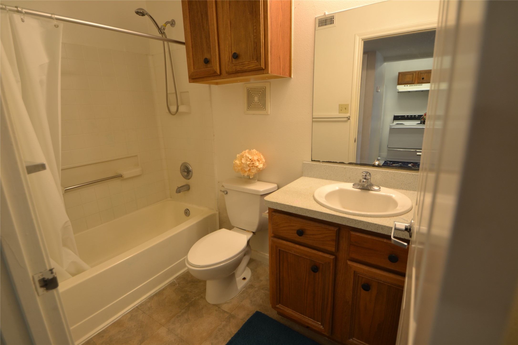 304 Dell Court, Unit 7 Houston, TX 77009 - Photo 21 of 36 a bathroom with a sink a toilet and shower