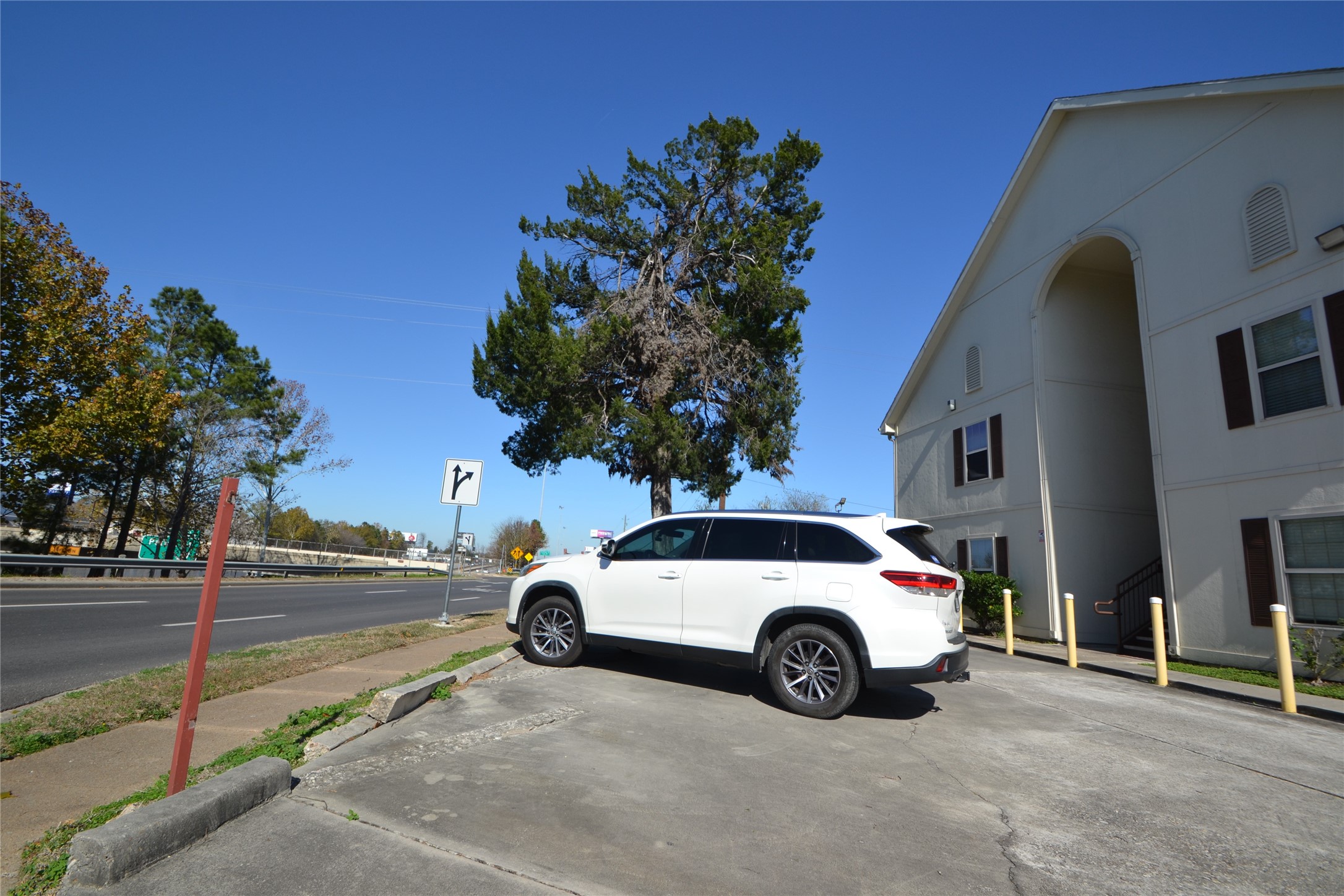 304 Dell Court, Unit 7 Houston, TX 77009 - Photo 8 of 36 a view of a cars parked in front of a building