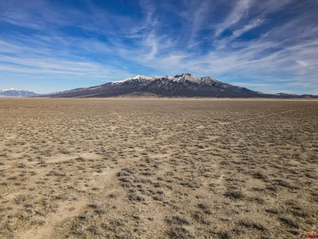 a view of lake and mountain