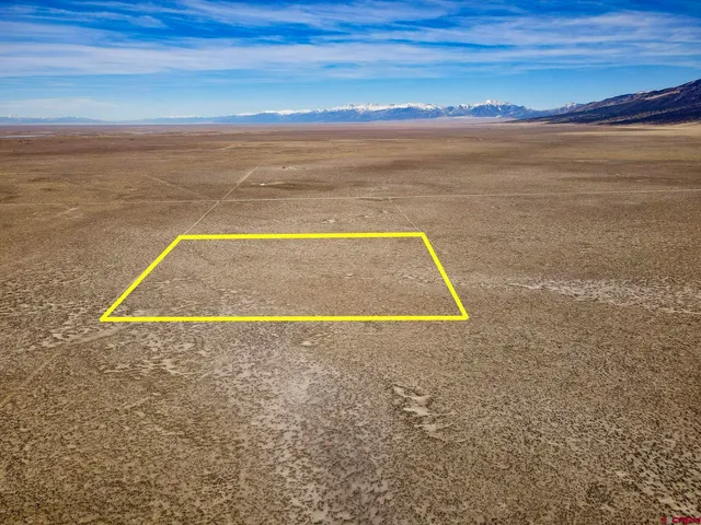 a view of an empty space and ocean view