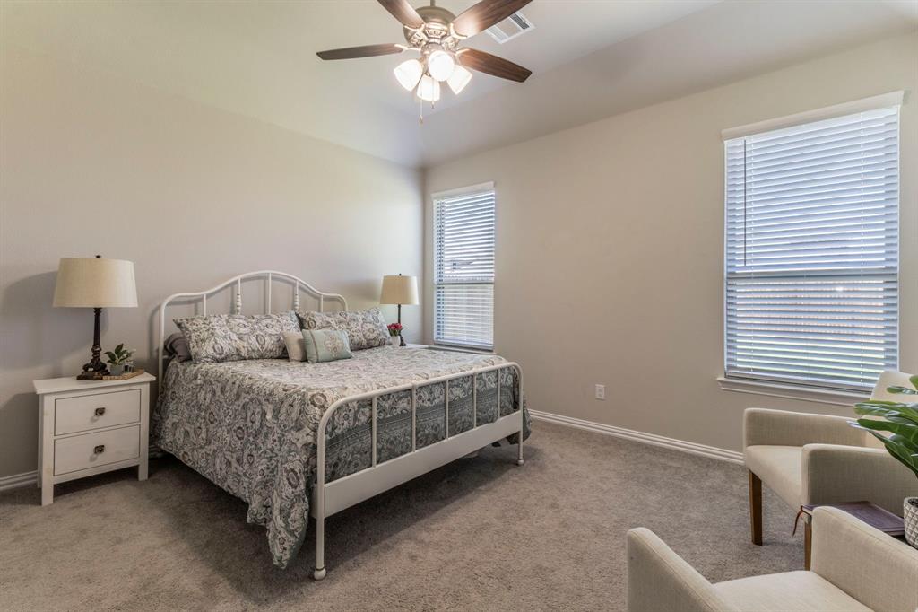 626 Ruthye Lane Pilot Point, TX 76258 - Photo 6 of 28 Bedroom featuring carpet flooring and ceiling fan