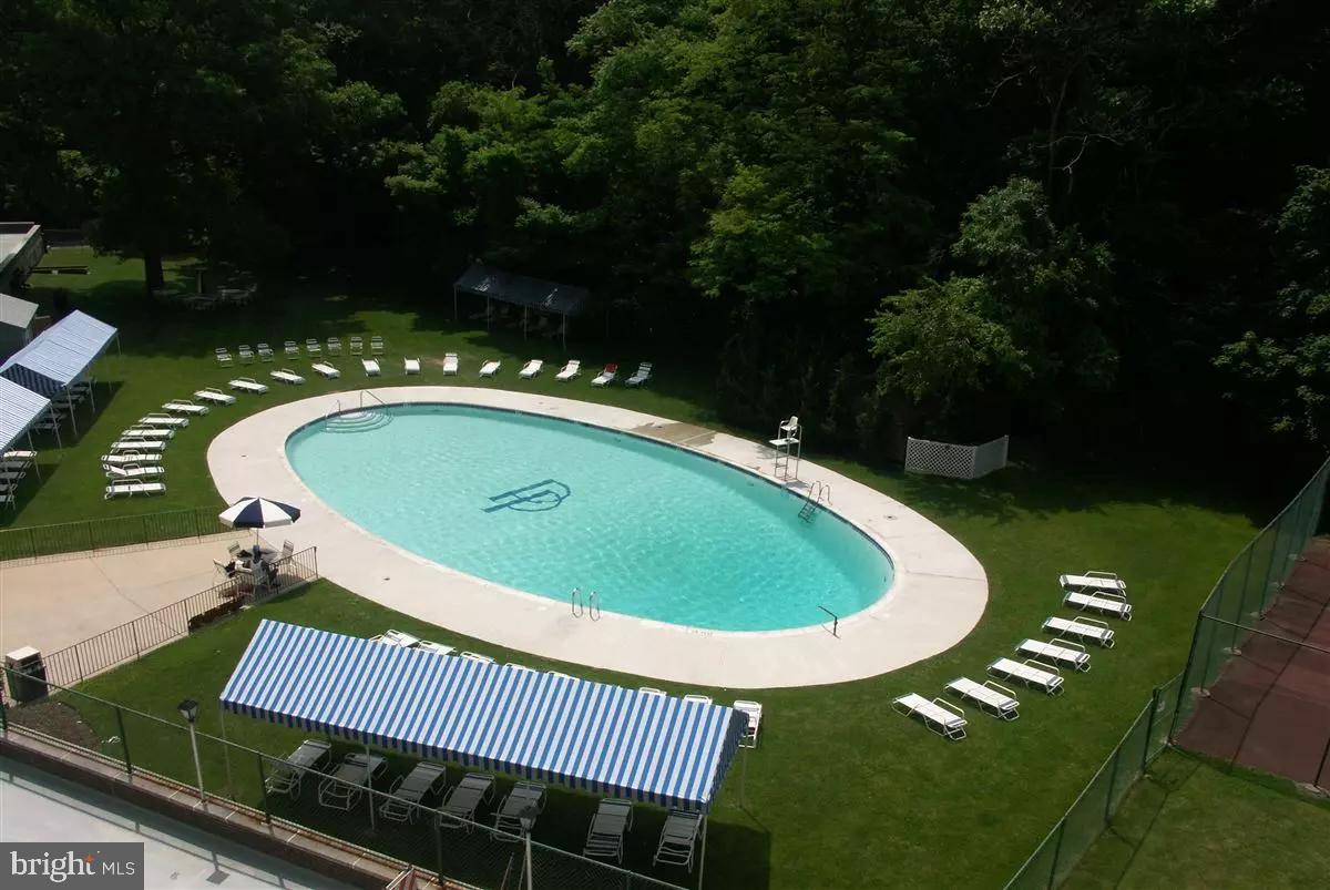 3900 West Ford Road, Unit 5M Philadelphia, PA 19131 - Photo 23 of 23 a view of a swimming pool with a patio