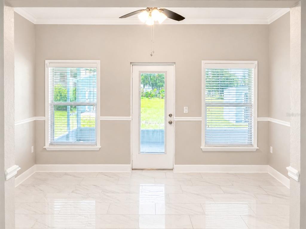 3834 Charter Road Lakeland, FL 33810 - Photo 14 of 39 a view of an empty room with a window