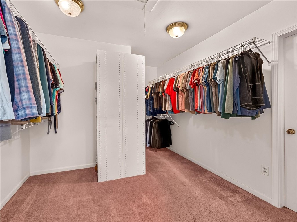 233 Dean Road Parma, NY 14559 - Photo 22 of 42 Primary bedroom walk-in-closet.