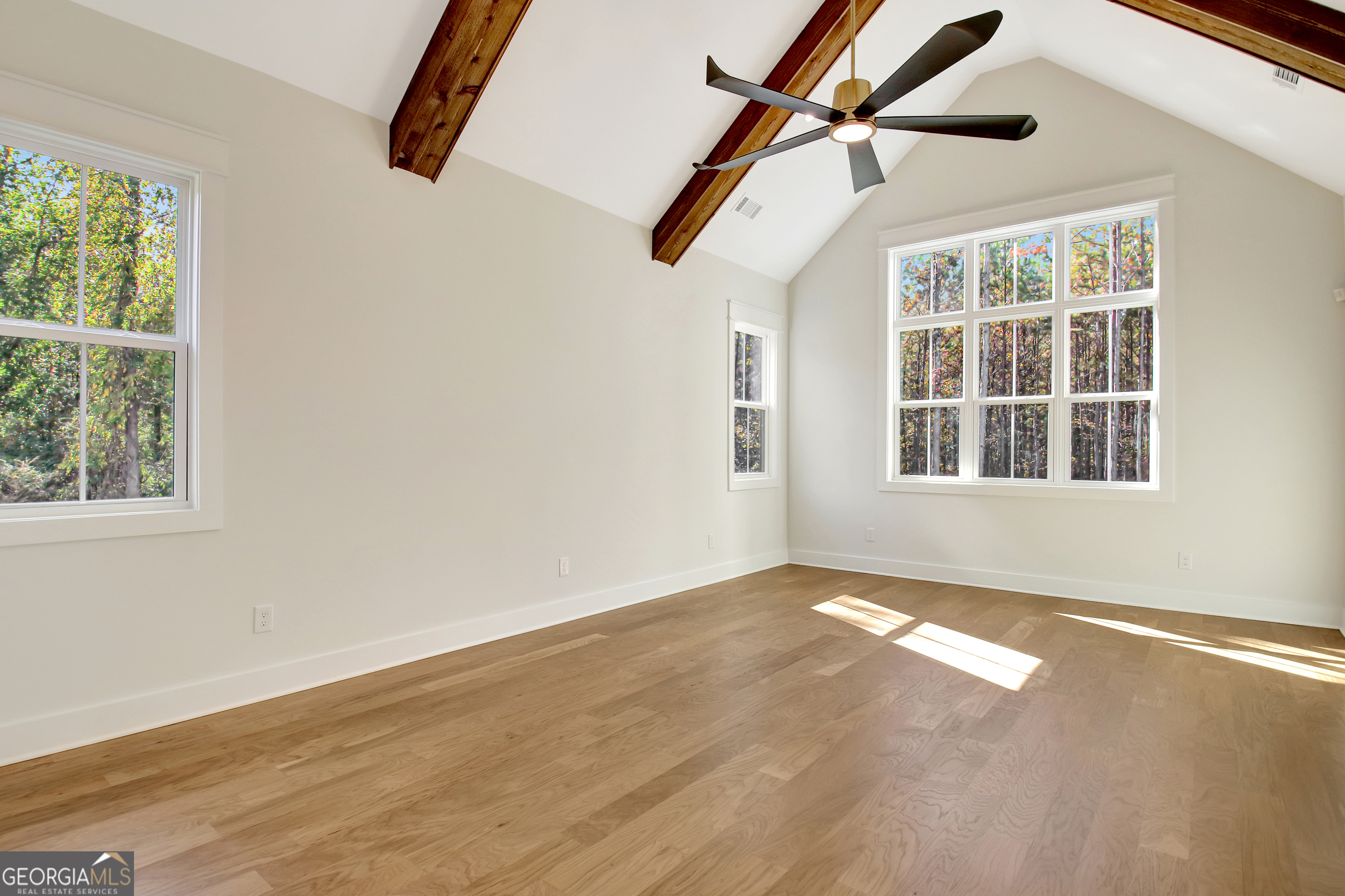 196 Bob Smith Road Sharpsburg, GA 30277 - Photo 35 of 68 a view of an empty room with windows