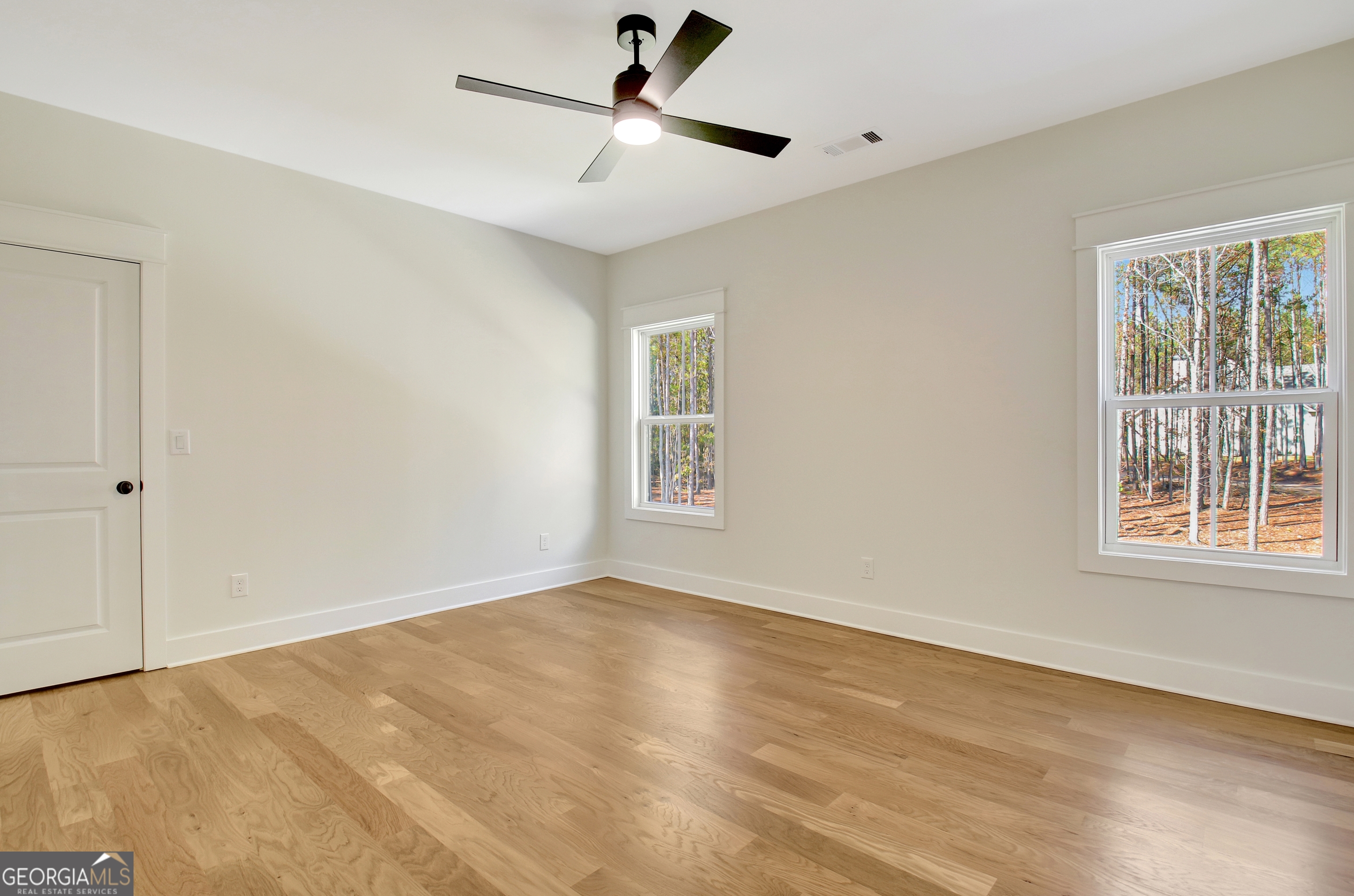 196 Bob Smith Road Sharpsburg, GA 30277 - Photo 50 of 68 a view of an empty room with a window