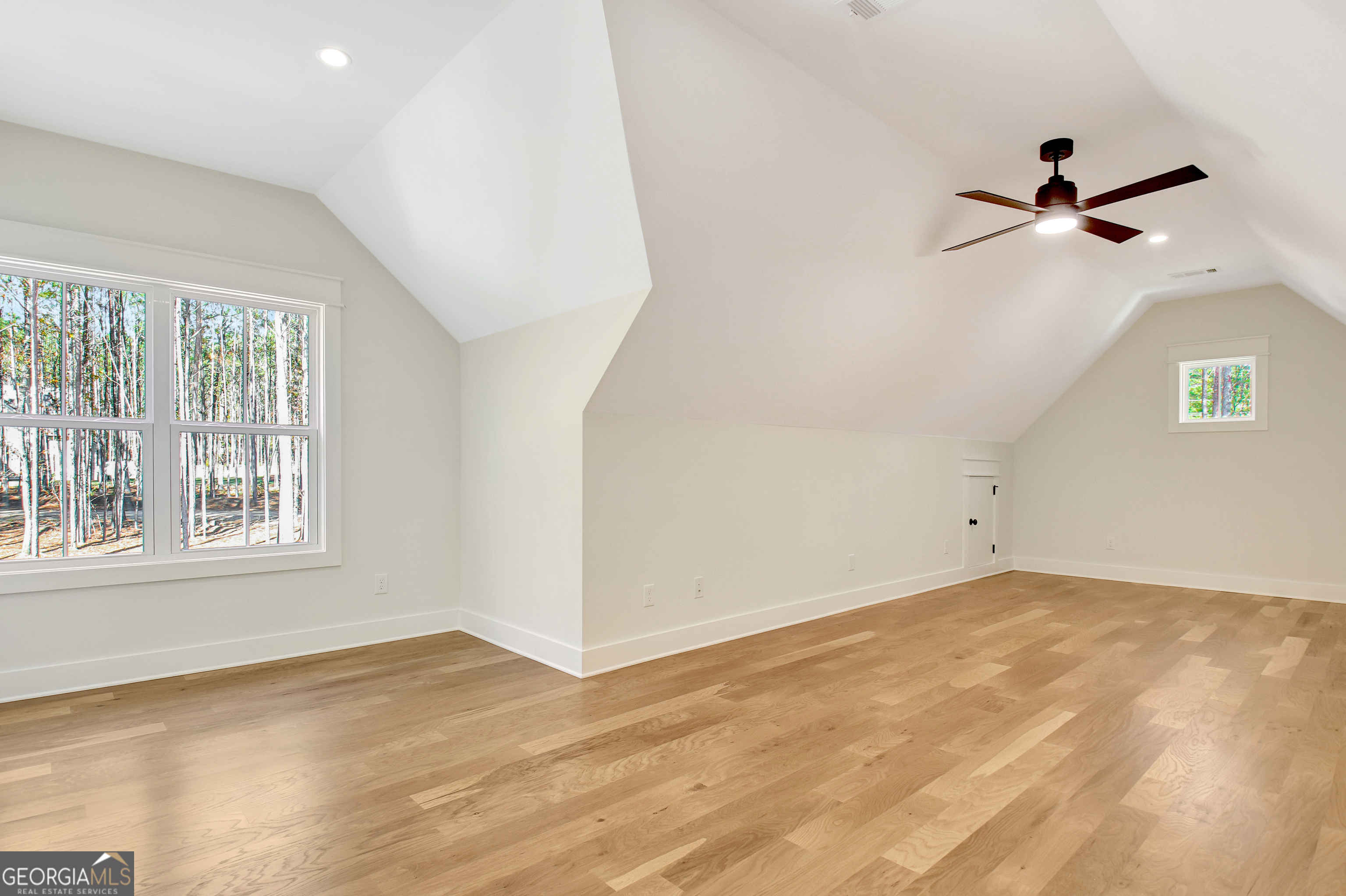 196 Bob Smith Road Sharpsburg, GA 30277 - Photo 56 of 68 an empty room with a window