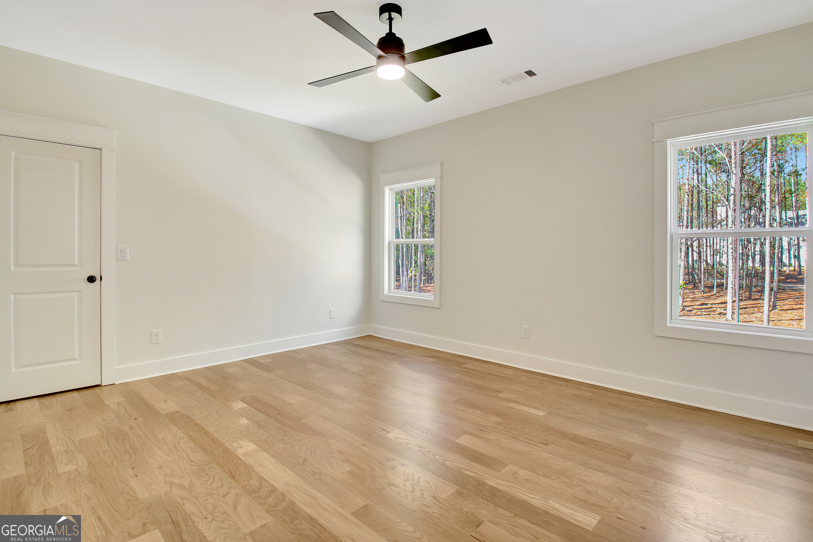 196 Bob Smith Road Sharpsburg, GA 30277 - Photo 58 of 68 a view of an empty room with a window