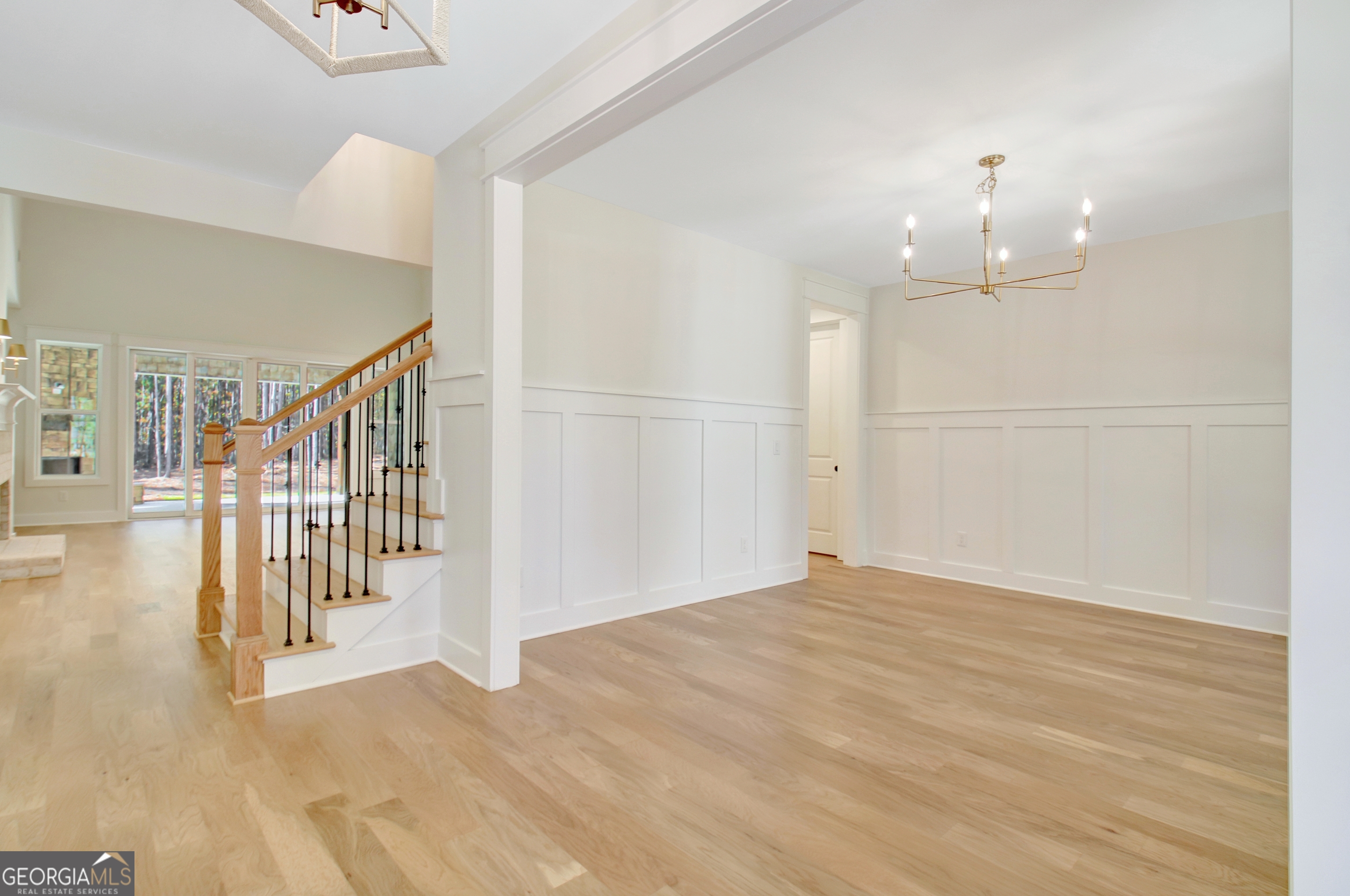 196 Bob Smith Road Sharpsburg, GA 30277 - Photo 8 of 68 a view of a hallway with staircase