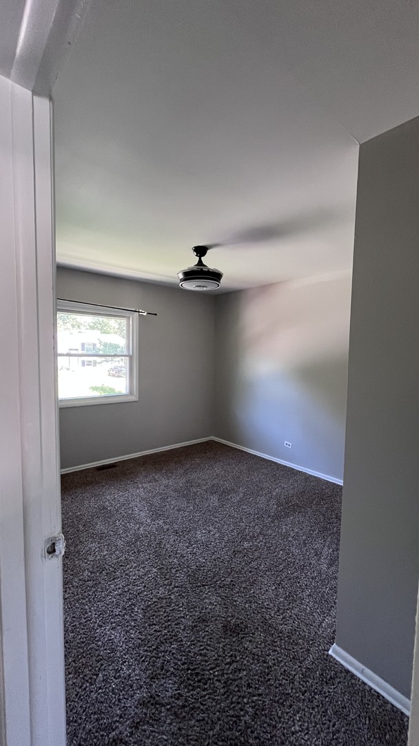 110 Woodcrest Circle Streamwood, IL 60107 - Photo 11 of 24 a view of empty room with window