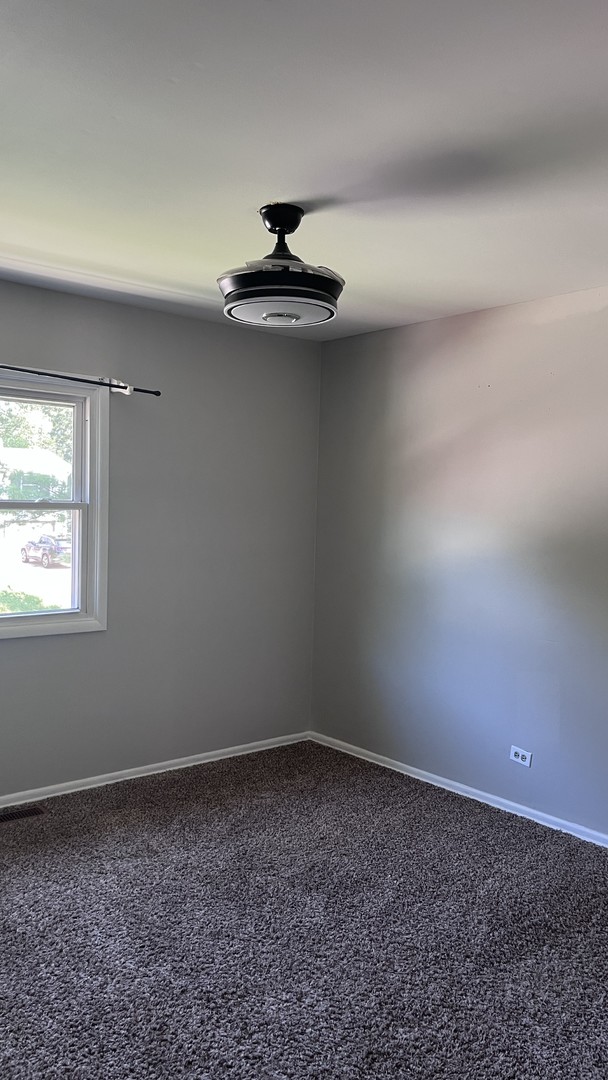 110 Woodcrest Circle Streamwood, IL 60107 - Photo 7 of 24 a view of an empty room
