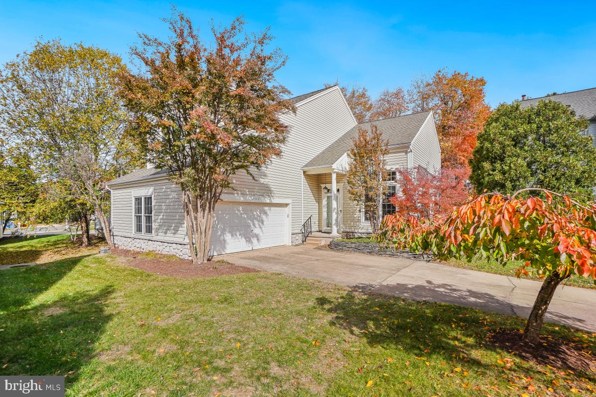 2442 Arctic Fox Way Reston, VA 20191 - Photo 1 of 58 a view of a house with a yard and tree s