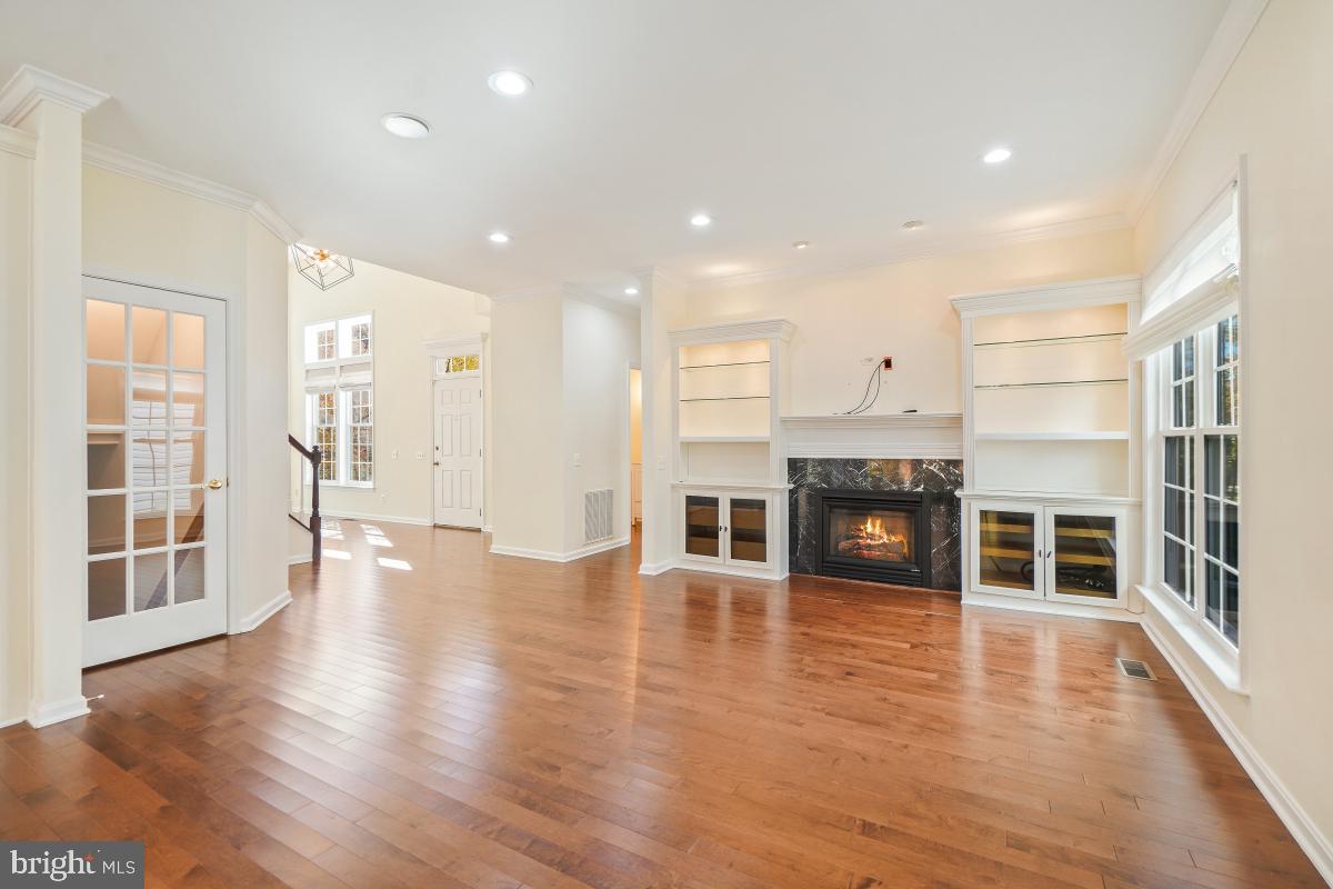 2442 Arctic Fox Way Reston, VA 20191 - Photo 11 of 58 a view of a kitchen with stainless steel appliances granite countertop a large window